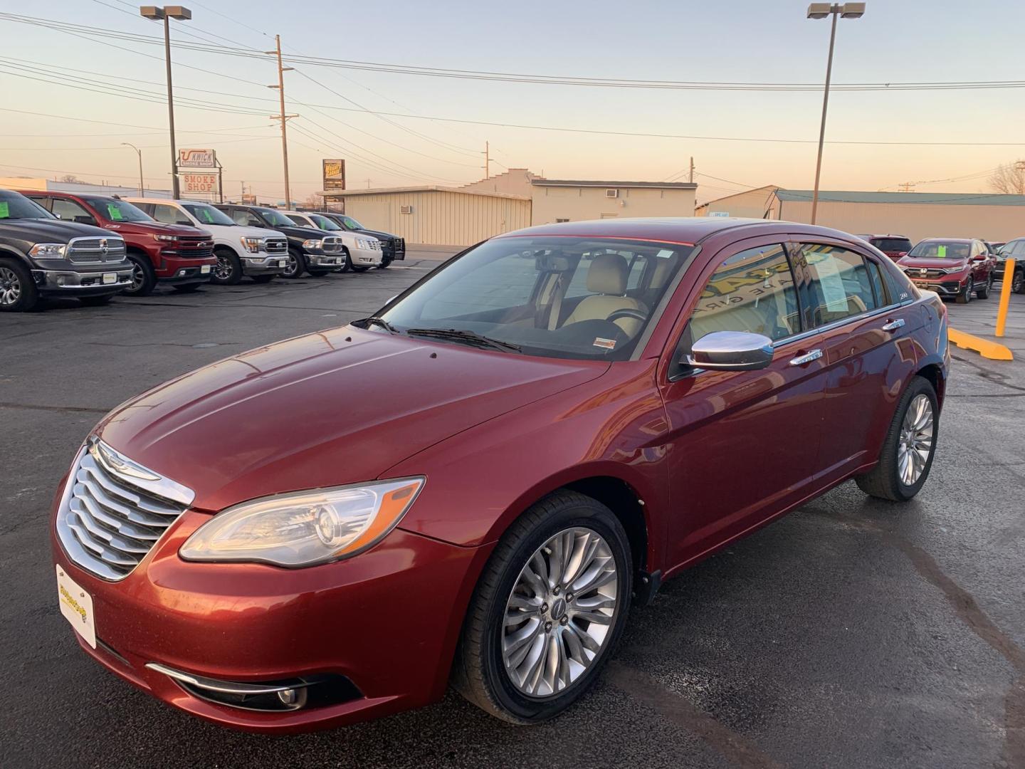 2011 MAROON /Tan Chrysler 200 Limited (1C3BC2FGXBN) with an 3.6L V6 DOHC 24V engine, 6-Speed Automatic transmission, located at 506 S. Kingshighway, Cape Girardeau, MO, 63703, (573) 235-5000, 37.294991, -89.553635 - 2011 Chrysler 200 Limited 77xxx miles Front Wheel Drive 3.6L 6 Cyl. Automatic Cruise Heated Seats Power Driver Seat Power Sunroof Leather Navigation Power Windows/Locks/Mirrors We have financing available and we accept trades! Fill out a credit application on our website or come by today - Photo#2