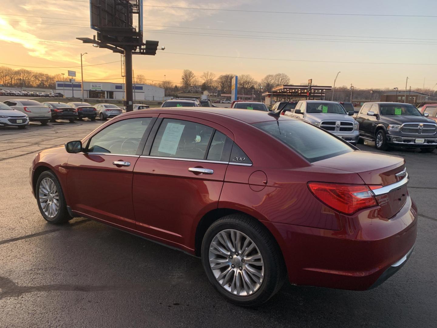 2011 MAROON /Tan Chrysler 200 Limited (1C3BC2FGXBN) with an 3.6L V6 DOHC 24V engine, 6-Speed Automatic transmission, located at 506 S. Kingshighway, Cape Girardeau, MO, 63703, (573) 235-5000, 37.294991, -89.553635 - 2011 Chrysler 200 Limited 77xxx miles Front Wheel Drive 3.6L 6 Cyl. Automatic Cruise Heated Seats Power Driver Seat Power Sunroof Leather Navigation Power Windows/Locks/Mirrors We have financing available and we accept trades! Fill out a credit application on our website or come by today - Photo#4