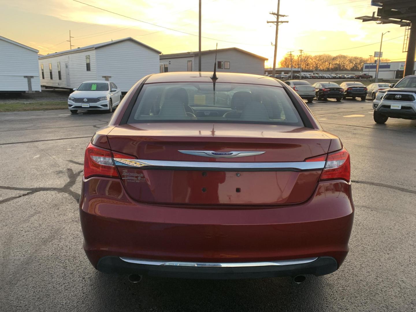 2011 MAROON /Tan Chrysler 200 Limited (1C3BC2FGXBN) with an 3.6L V6 DOHC 24V engine, 6-Speed Automatic transmission, located at 506 S. Kingshighway, Cape Girardeau, MO, 63703, (573) 235-5000, 37.294991, -89.553635 - 2011 Chrysler 200 Limited 77xxx miles Front Wheel Drive 3.6L 6 Cyl. Automatic Cruise Heated Seats Power Driver Seat Power Sunroof Leather Navigation Power Windows/Locks/Mirrors We have financing available and we accept trades! Fill out a credit application on our website or come by today - Photo#5