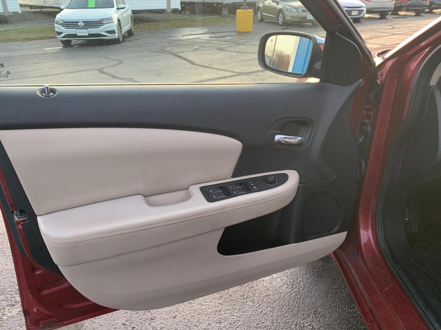 2011 MAROON /Tan Chrysler 200 Limited (1C3BC2FGXBN) with an 3.6L V6 DOHC 24V engine, 6-Speed Automatic transmission, located at 506 S. Kingshighway, Cape Girardeau, MO, 63703, (573) 235-5000, 37.294991, -89.553635 - 2011 Chrysler 200 Limited 77xxx miles Front Wheel Drive 3.6L 6 Cyl. Automatic Cruise Heated Seats Power Driver Seat Power Sunroof Leather Navigation Power Windows/Locks/Mirrors We have financing available and we accept trades! Fill out a credit application on our website or come by today - Photo#12