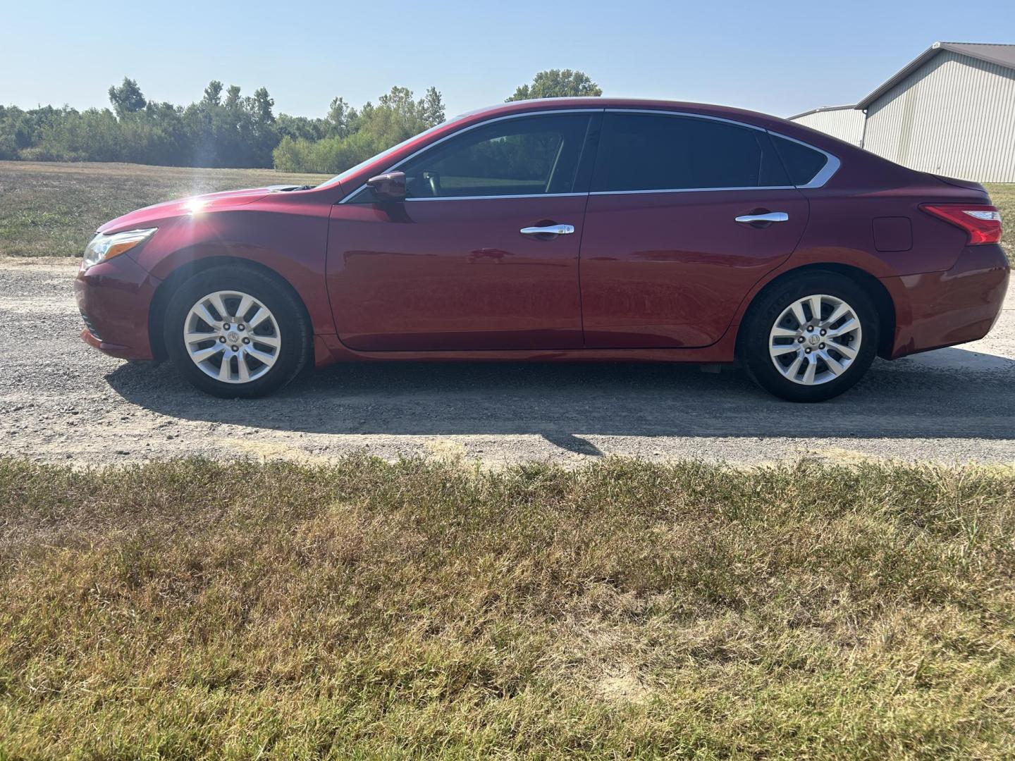 2017 MAROON /Black Nissan Altima 2.5 S (1N4AL3AP0HC) with an 2.5L L4 DOHC 16V engine, CVT transmission, located at 506 S. Kingshighway, Cape Girardeau, MO, 63703, (573) 235-5000, 37.294991, -89.553635 - 2017 Nissan Altima 2.5 S 128xxx miles Front Wheel Drive 2.5L 4 Cyl. Automatic Backup Camera Power Driver Seat Remote Start Cruise Power Windows/Locks/Mirrors We have financing available and we accept trades! Fill out a credit application on our website or come by today! If you have any qu - Photo#8