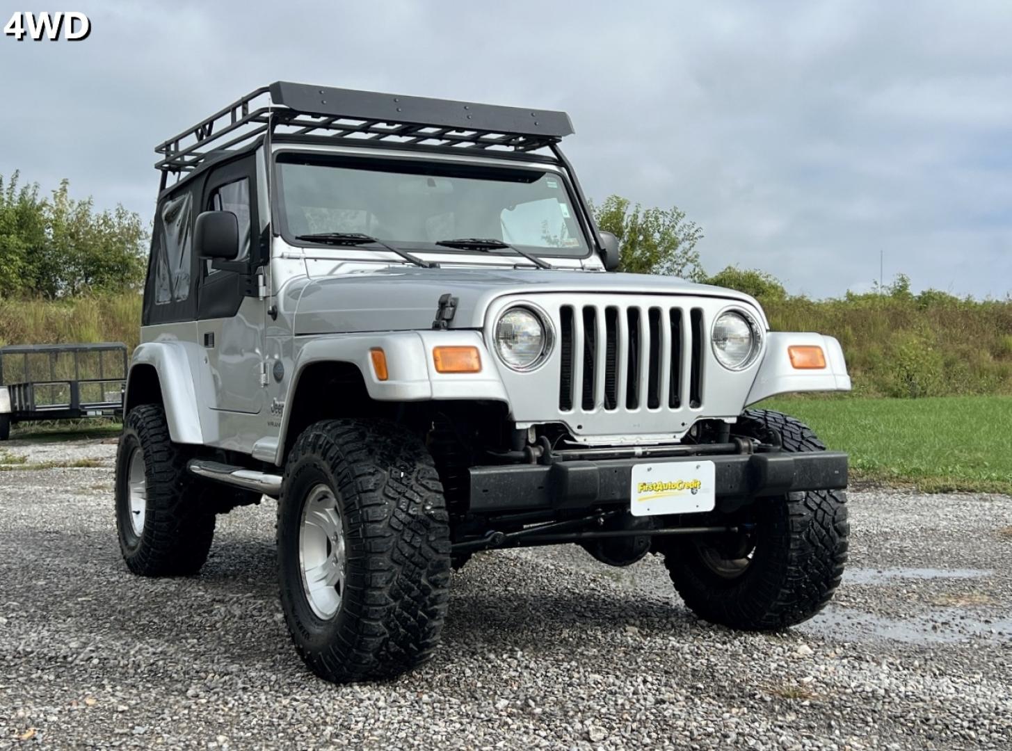 2005 SILVER /Black Cloth Jeep Wrangler X (1J4FA39S45P) with an 4.0L 6 Cyl. engine, Automatic transmission, located at 2990 Old Orchard Rd., Jackson, MO, 63755, 37.354214, -89.612106 - 2005 Jeep Wrangler X 104xxx miles 4 Wheel Drive 4.0L I6 Automatic We have financing available and we accept trades! Fill out a credit application on our website or come by today! If you have any questions, give us a call at (573) 204-7777 or visit our website at firstautocredit.com. - Photo#0