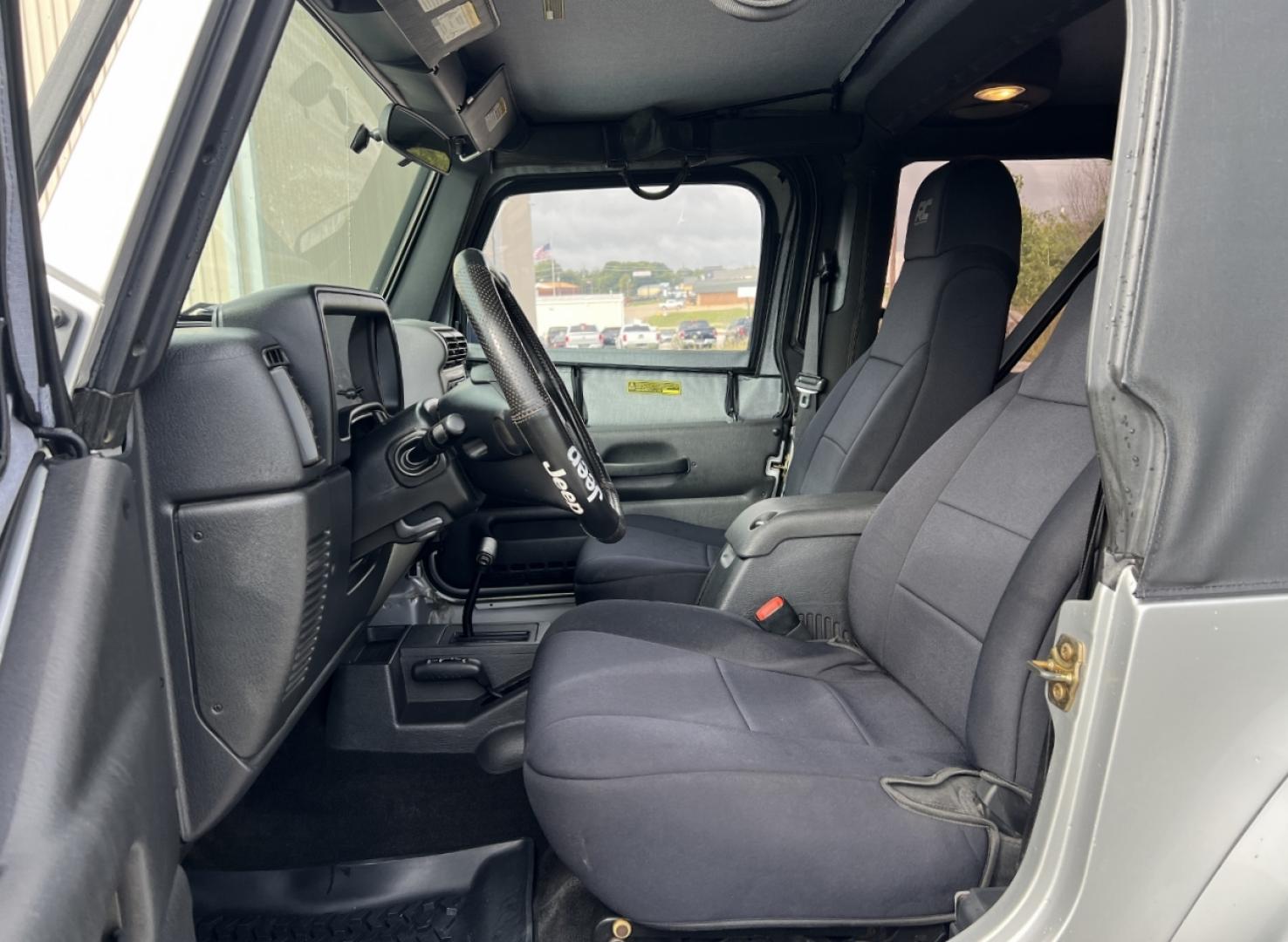 2005 SILVER /Black Cloth Jeep Wrangler X (1J4FA39S45P) with an 4.0L 6 Cyl. engine, Automatic transmission, located at 2990 Old Orchard Rd., Jackson, MO, 63755, 37.354214, -89.612106 - 2005 Jeep Wrangler X 104xxx miles 4 Wheel Drive 4.0L I6 Automatic We have financing available and we accept trades! Fill out a credit application on our website or come by today! If you have any questions, give us a call at (573) 204-7777 or visit our website at firstautocredit.com. - Photo#11