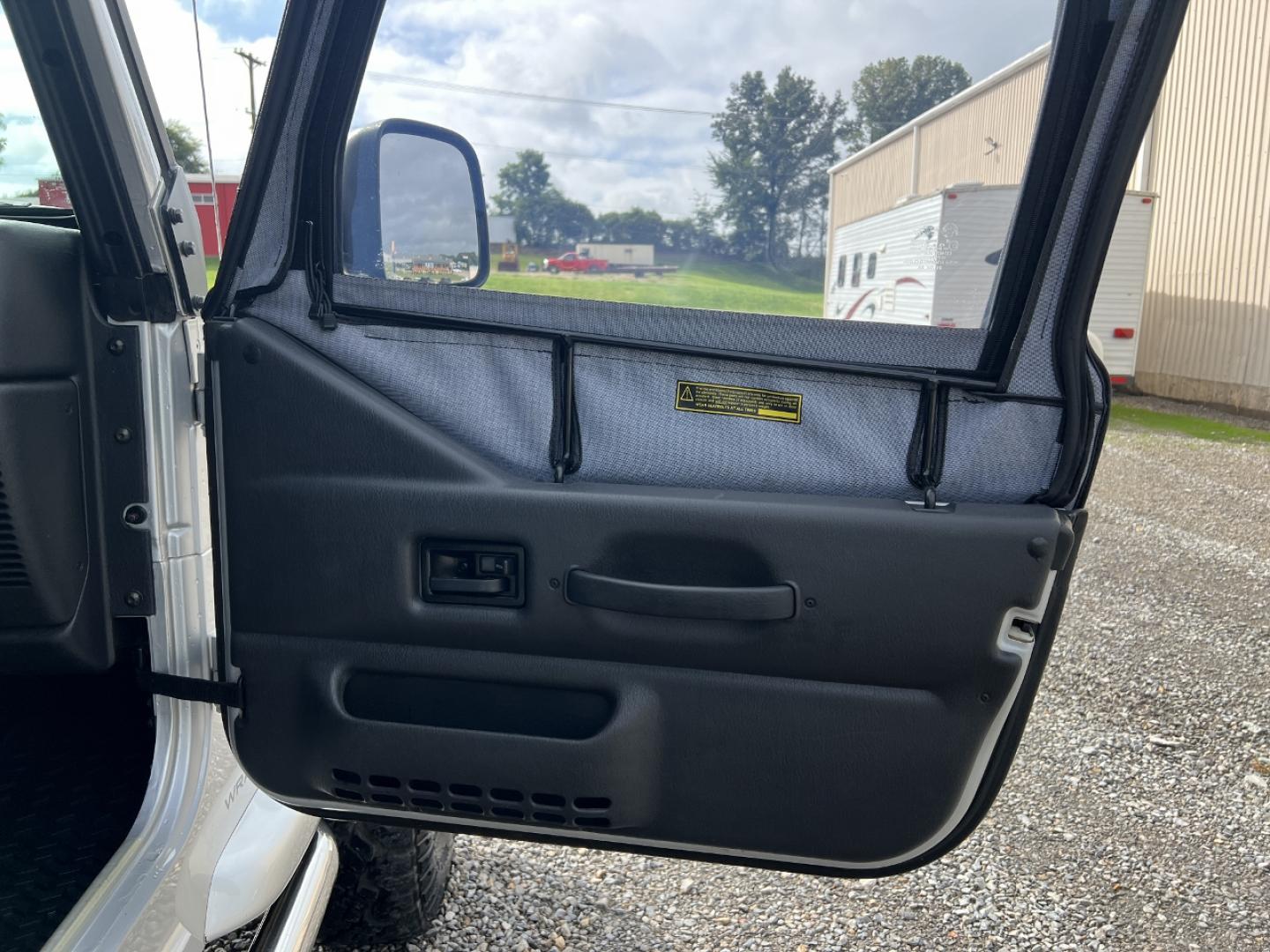 2005 SILVER /Black Cloth Jeep Wrangler X (1J4FA39S45P) with an 4.0L 6 Cyl. engine, Automatic transmission, located at 2990 Old Orchard Rd., Jackson, MO, 63755, 37.354214, -89.612106 - 2005 Jeep Wrangler X 104xxx miles 4 Wheel Drive 4.0L I6 Automatic We have financing available and we accept trades! Fill out a credit application on our website or come by today! If you have any questions, give us a call at (573) 204-7777 or visit our website at firstautocredit.com. - Photo#12