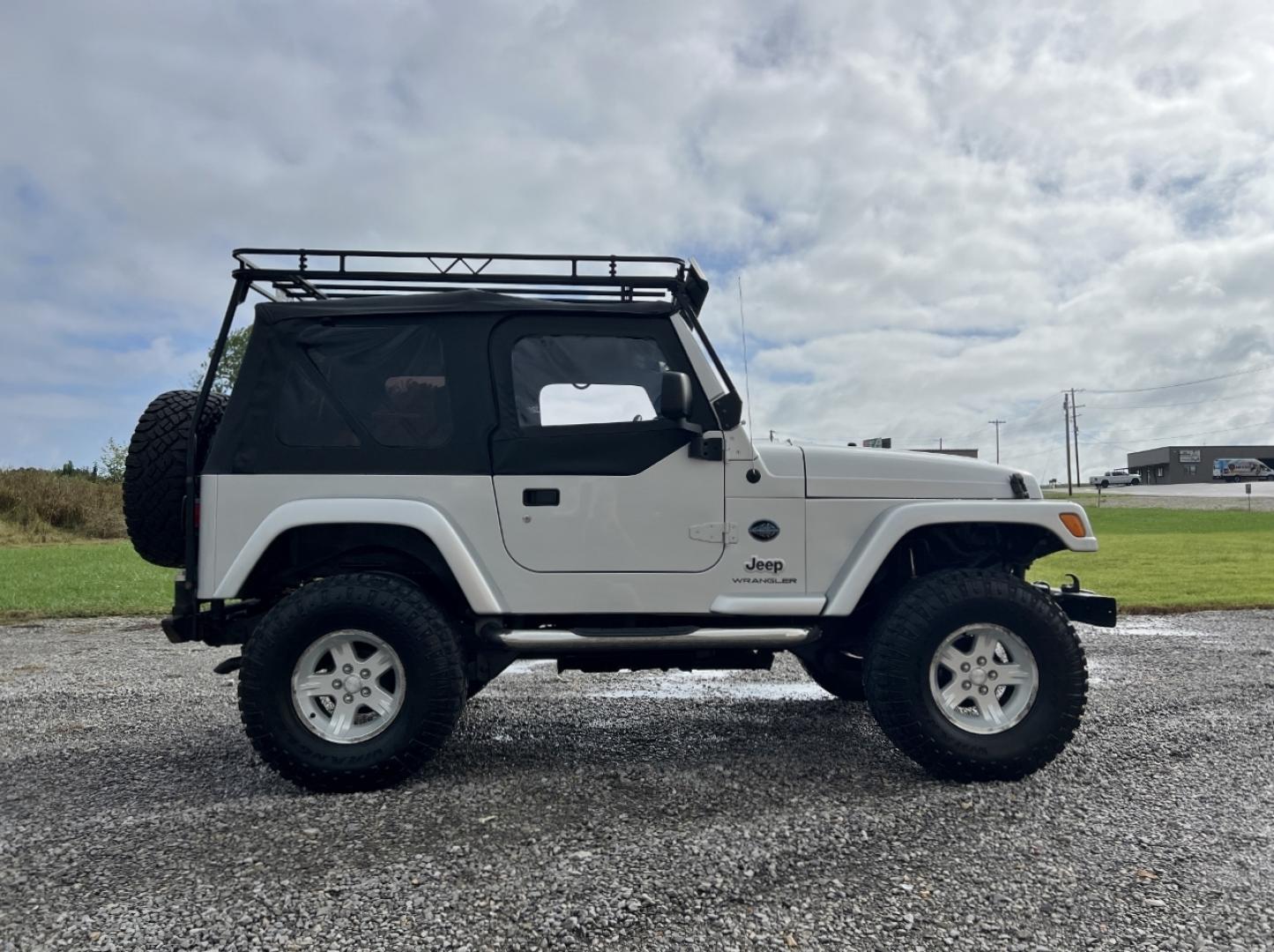 2005 SILVER /Black Cloth Jeep Wrangler X (1J4FA39S45P) with an 4.0L 6 Cyl. engine, Automatic transmission, located at 2990 Old Orchard Rd., Jackson, MO, 63755, 37.354214, -89.612106 - 2005 Jeep Wrangler X 104xxx miles 4 Wheel Drive 4.0L I6 Automatic We have financing available and we accept trades! Fill out a credit application on our website or come by today! If you have any questions, give us a call at (573) 204-7777 or visit our website at firstautocredit.com. - Photo#5