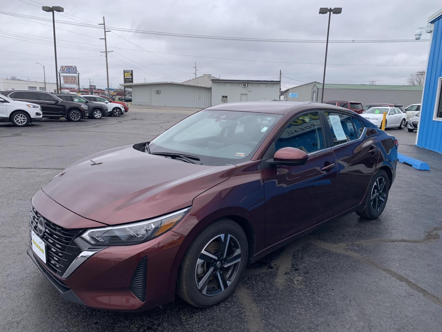 2024 BURGUNDY /Black Cloth Nissan Sentra SV (3N1AB8CV6RY) with an 2.0L 4 Cyl. engine, Automatic transmission, located at 506 S. Kingshighway, Cape Girardeau, MO, 63703, (573) 235-5000, 37.294991, -89.553635 - 2024 Nissan Sentra SV 1-Owner 88xxx miles Front Wheel Drive 2.0L 4 Cyl. Automatic Backup Camera Bluetooth Cruise Power Windows/Locks/Mirrors We have financing available and we accept trades! Fill out a credit application on our website or come by today! If you have any questions, give u - Photo#3