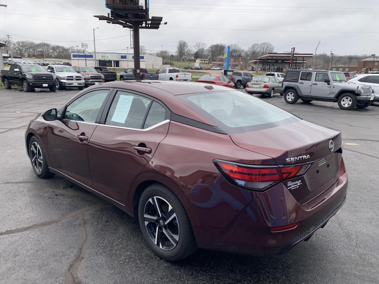 2024 BURGUNDY /Black Cloth Nissan Sentra SV (3N1AB8CV6RY) with an 2.0L 4 Cyl. engine, Automatic transmission, located at 506 S. Kingshighway, Cape Girardeau, MO, 63703, (573) 235-5000, 37.294991, -89.553635 - 2024 Nissan Sentra SV 1-Owner 88xxx miles Front Wheel Drive 2.0L 4 Cyl. Automatic Backup Camera Bluetooth Cruise Power Windows/Locks/Mirrors We have financing available and we accept trades! Fill out a credit application on our website or come by today! If you have any questions, give u - Photo#5