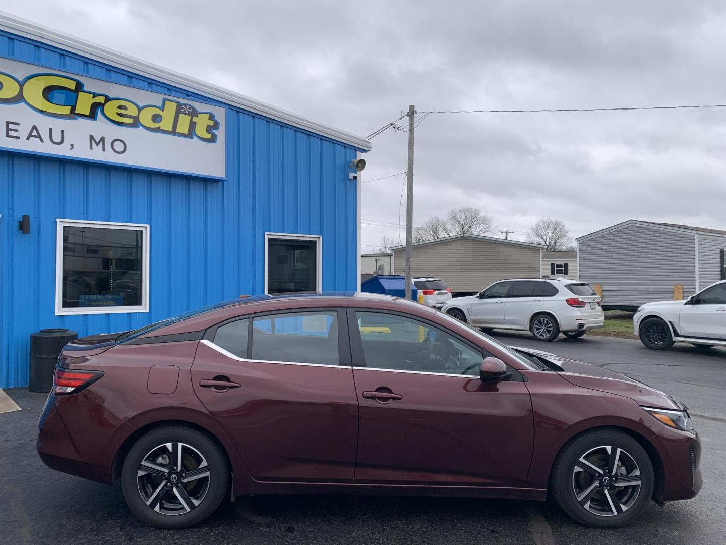 2024 BURGUNDY /Black Cloth Nissan Sentra SV (3N1AB8CV6RY) with an 2.0L 4 Cyl. engine, Automatic transmission, located at 506 S. Kingshighway, Cape Girardeau, MO, 63703, (573) 235-5000, 37.294991, -89.553635 - 2024 Nissan Sentra SV 1-Owner 88xxx miles Front Wheel Drive 2.0L 4 Cyl. Automatic Backup Camera Bluetooth Cruise Power Windows/Locks/Mirrors We have financing available and we accept trades! Fill out a credit application on our website or come by today! If you have any questions, give u - Photo#9