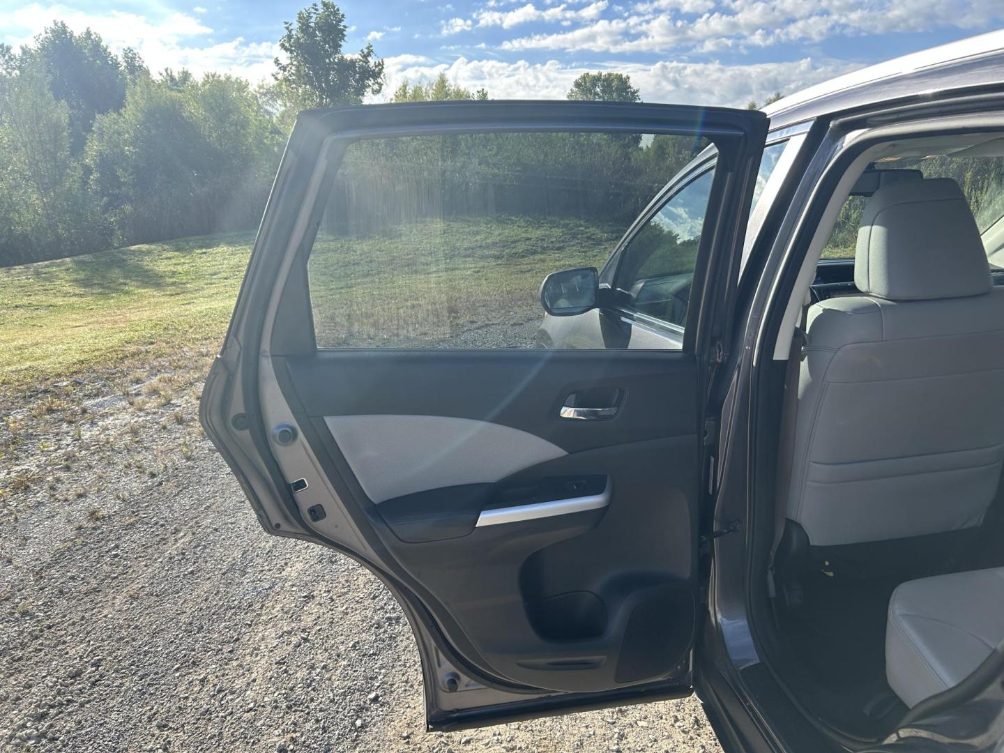 2016 GRAY /Gray Honda CR-V EX-L AWD (5J6RM4H76GL) with an 2.4L L4 DOHC 16V engine, CVT transmission, located at 506 S. Kingshighway, Cape Girardeau, MO, 63703, (573) 235-5000, 37.294991, -89.553635 - 2016 Honda CR-V EX-L 219xxx miles All Wheel Drive 2.4L 4 Cyl. Automatic Leather Backup Camera Power/Heated Seats Sunroof Bluetooth Cruise Power Windows/Locks/Mirrors We have financing available and we accept trades! Fill out a credit application on our website or come by today! If you h - Photo#19