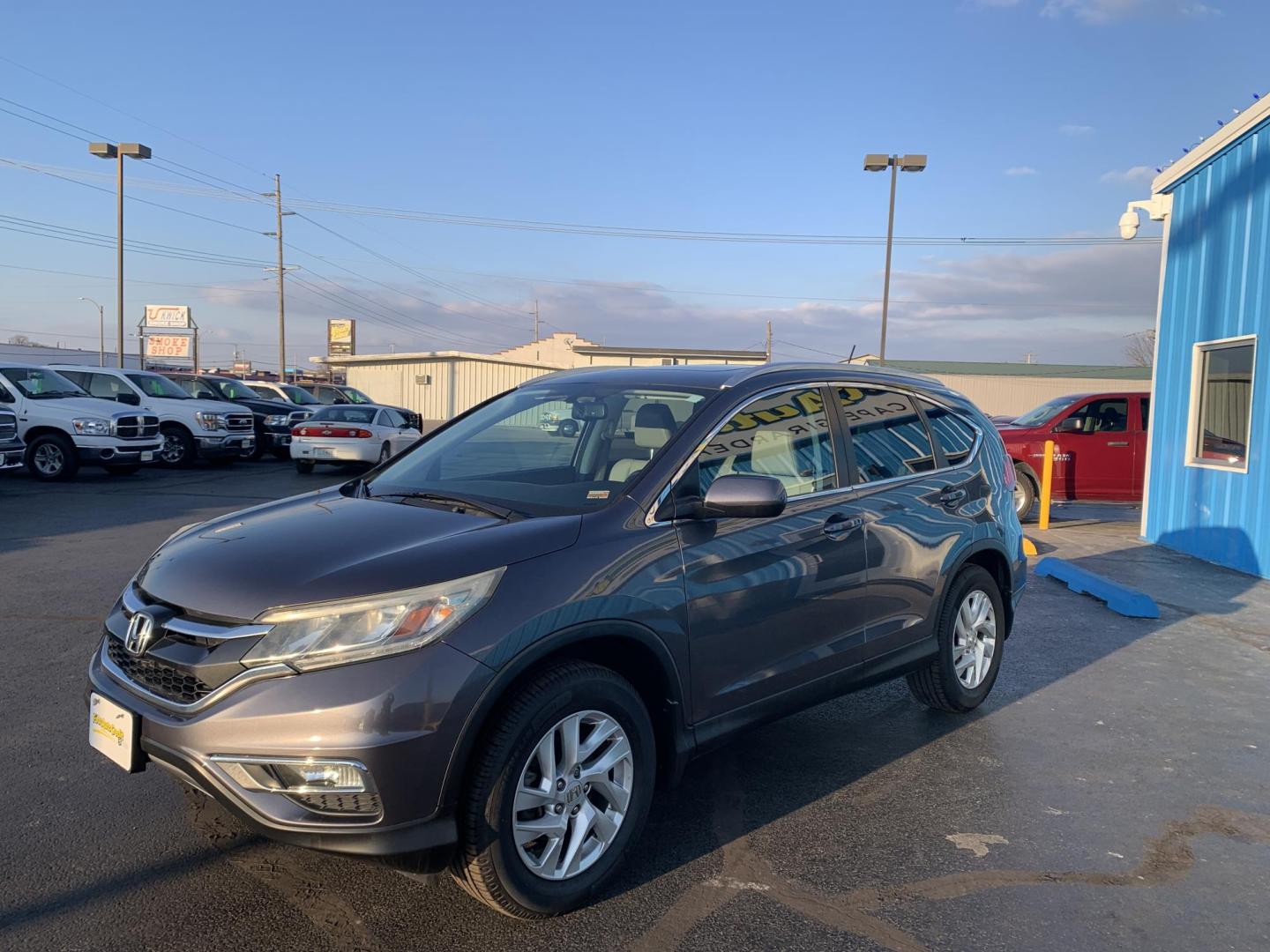 2016 GRAY /Gray Honda CR-V EX-L AWD (5J6RM4H76GL) with an 2.4L L4 DOHC 16V engine, CVT transmission, located at 506 S. Kingshighway, Cape Girardeau, MO, 63703, (573) 235-5000, 37.294991, -89.553635 - 2016 Honda CR-V EX-L 219xxx miles All Wheel Drive 2.4L 4 Cyl. Automatic Leather Backup Camera Power/Heated Seats Sunroof Bluetooth Cruise Power Windows/Locks/Mirrors We have financing available and we accept trades! Fill out a credit application on our website or come by today! If you h - Photo#2