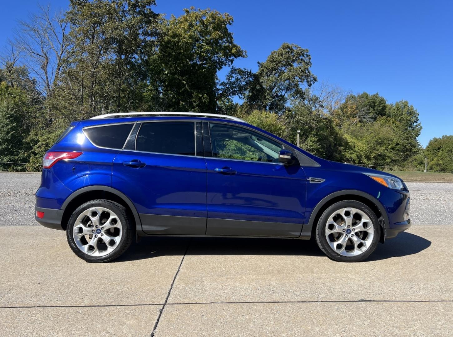 2015 BLUE /Black Leather Ford Escape Titanium FWD (1FMCU0J95FU) with an 2.0L 4 Cyl. engine, Automatic transmission, located at 2990 Old Orchard Rd., Jackson, MO, 63755, 37.354214, -89.612106 - 2015 Ford Escape Titanium 111xxx miles Front Wheel Drive 2.0L 4 Cyl. Automatic Leather Navigation Power/Heated Seats Backup Camera Bluetooth Remote Start Cruise Power Windows/Locks/Mirrors We have financing available and we accept trades! Fill out a credit application on our website or - Photo#10