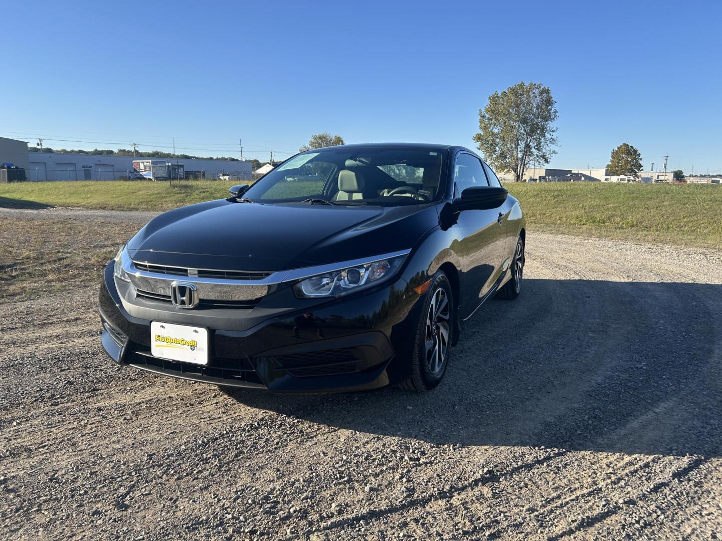 2016 BLACK /Tan Honda Civic LX-P Coupe CVT (2HGFC4B05GH) with an 2.0L L4 DOHC 16V engine, CVT transmission, located at 506 S. Kingshighway, Cape Girardeau, MO, 63703, (573) 235-5000, 37.294991, -89.553635 - 2016 Honda Civic LX-P Coupe Only 64xxx miles Front Wheel Drive 2.0L 4 Cyl. Automatic Sunroof Backup Camera Bluetooth Remote Start Cruise Power Windows/Locks/Mirrors We have financing available and we accept trades! Fill out a credit application on our website or come by today! If you hav - Photo#6