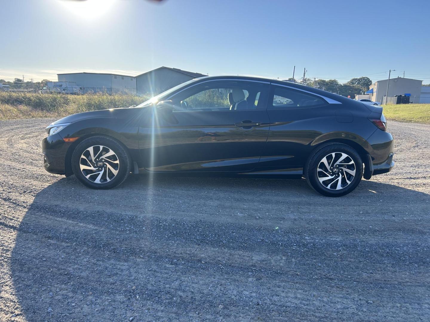 2016 BLACK /Tan Honda Civic LX-P Coupe CVT (2HGFC4B05GH) with an 2.0L L4 DOHC 16V engine, CVT transmission, located at 506 S. Kingshighway, Cape Girardeau, MO, 63703, (573) 235-5000, 37.294991, -89.553635 - 2016 Honda Civic LX-P Coupe Only 64xxx miles Front Wheel Drive 2.0L 4 Cyl. Automatic Sunroof Backup Camera Bluetooth Remote Start Cruise Power Windows/Locks/Mirrors We have financing available and we accept trades! Fill out a credit application on our website or come by today! If you hav - Photo#7