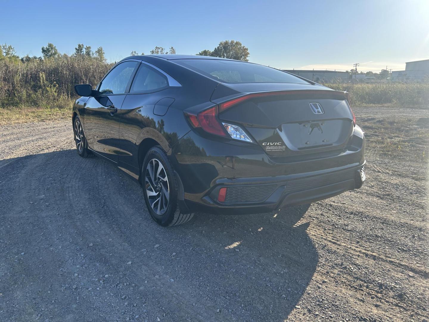 2016 BLACK /Tan Honda Civic LX-P Coupe CVT (2HGFC4B05GH) with an 2.0L L4 DOHC 16V engine, CVT transmission, located at 506 S. Kingshighway, Cape Girardeau, MO, 63703, (573) 235-5000, 37.294991, -89.553635 - 2016 Honda Civic LX-P Coupe Only 64xxx miles Front Wheel Drive 2.0L 4 Cyl. Automatic Sunroof Backup Camera Bluetooth Remote Start Cruise Power Windows/Locks/Mirrors We have financing available and we accept trades! Fill out a credit application on our website or come by today! If you hav - Photo#8