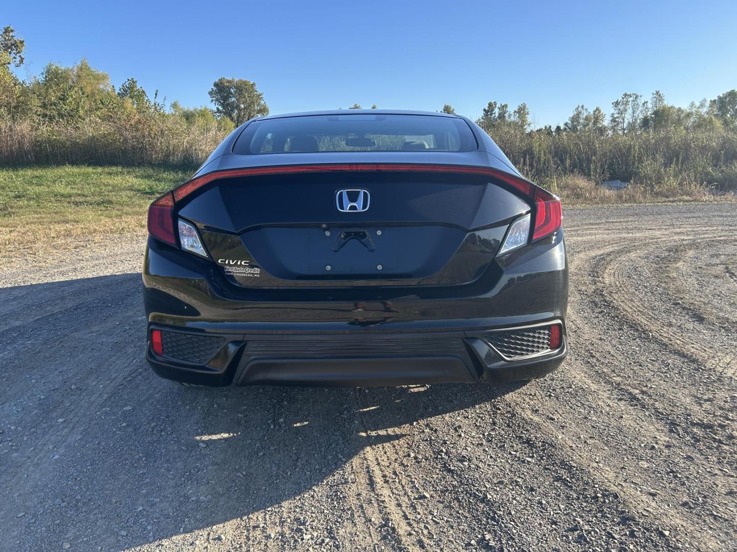 2016 BLACK /Tan Honda Civic LX-P Coupe CVT (2HGFC4B05GH) with an 2.0L L4 DOHC 16V engine, CVT transmission, located at 506 S. Kingshighway, Cape Girardeau, MO, 63703, (573) 235-5000, 37.294991, -89.553635 - 2016 Honda Civic LX-P Coupe Only 64xxx miles Front Wheel Drive 2.0L 4 Cyl. Automatic Sunroof Backup Camera Bluetooth Remote Start Cruise Power Windows/Locks/Mirrors We have financing available and we accept trades! Fill out a credit application on our website or come by today! If you hav - Photo#9