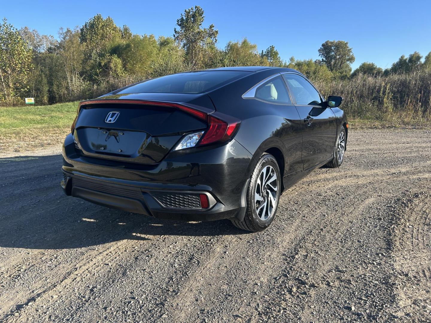 2016 BLACK /Tan Honda Civic LX-P Coupe CVT (2HGFC4B05GH) with an 2.0L L4 DOHC 16V engine, CVT transmission, located at 506 S. Kingshighway, Cape Girardeau, MO, 63703, (573) 235-5000, 37.294991, -89.553635 - 2016 Honda Civic LX-P Coupe Only 64xxx miles Front Wheel Drive 2.0L 4 Cyl. Automatic Sunroof Backup Camera Bluetooth Remote Start Cruise Power Windows/Locks/Mirrors We have financing available and we accept trades! Fill out a credit application on our website or come by today! If you hav - Photo#10