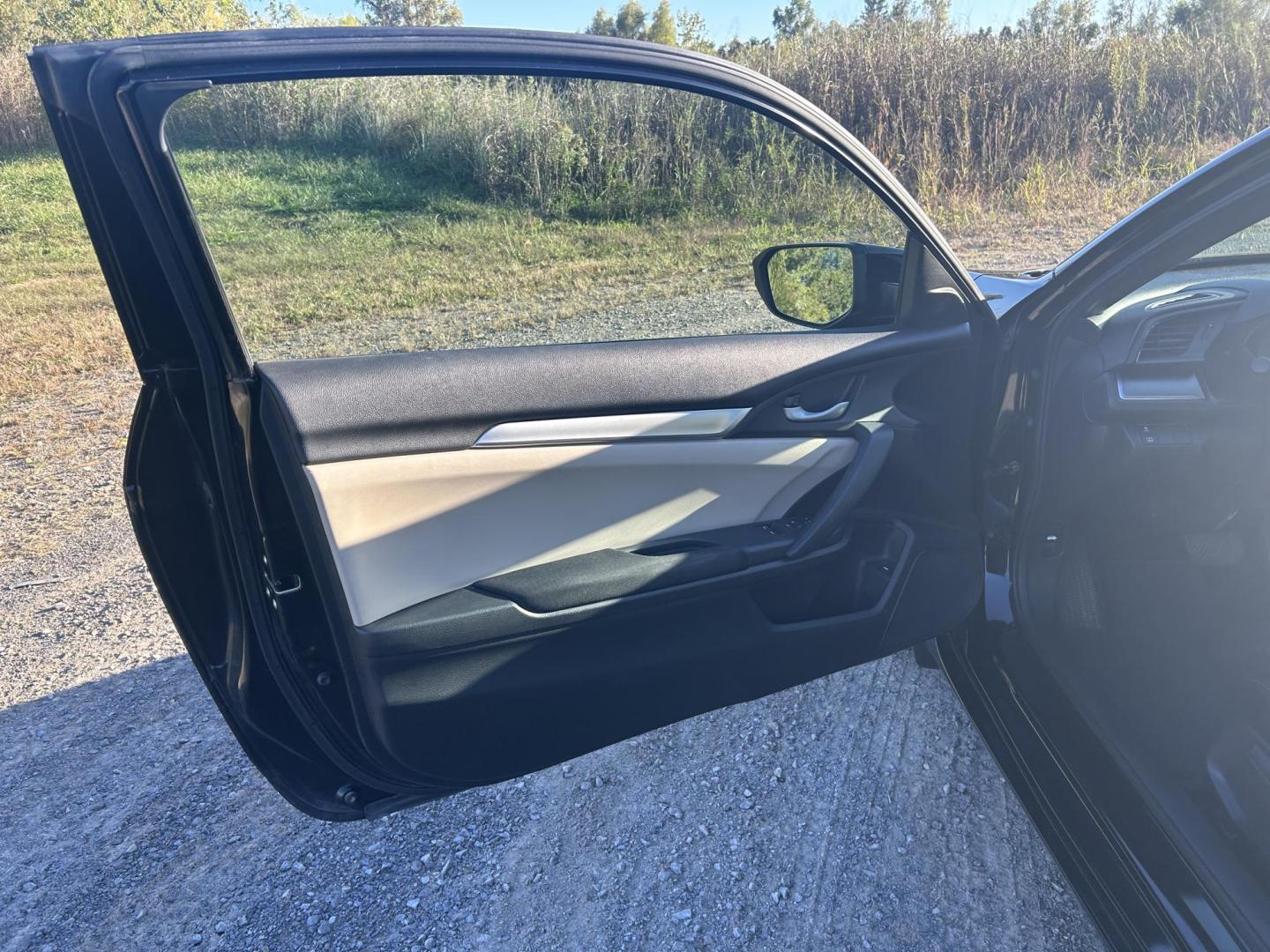 2016 BLACK /Tan Honda Civic LX-P Coupe CVT (2HGFC4B05GH) with an 2.0L L4 DOHC 16V engine, CVT transmission, located at 506 S. Kingshighway, Cape Girardeau, MO, 63703, (573) 235-5000, 37.294991, -89.553635 - 2016 Honda Civic LX-P Coupe Only 64xxx miles Front Wheel Drive 2.0L 4 Cyl. Automatic Sunroof Backup Camera Bluetooth Remote Start Cruise Power Windows/Locks/Mirrors We have financing available and we accept trades! Fill out a credit application on our website or come by today! If you hav - Photo#14