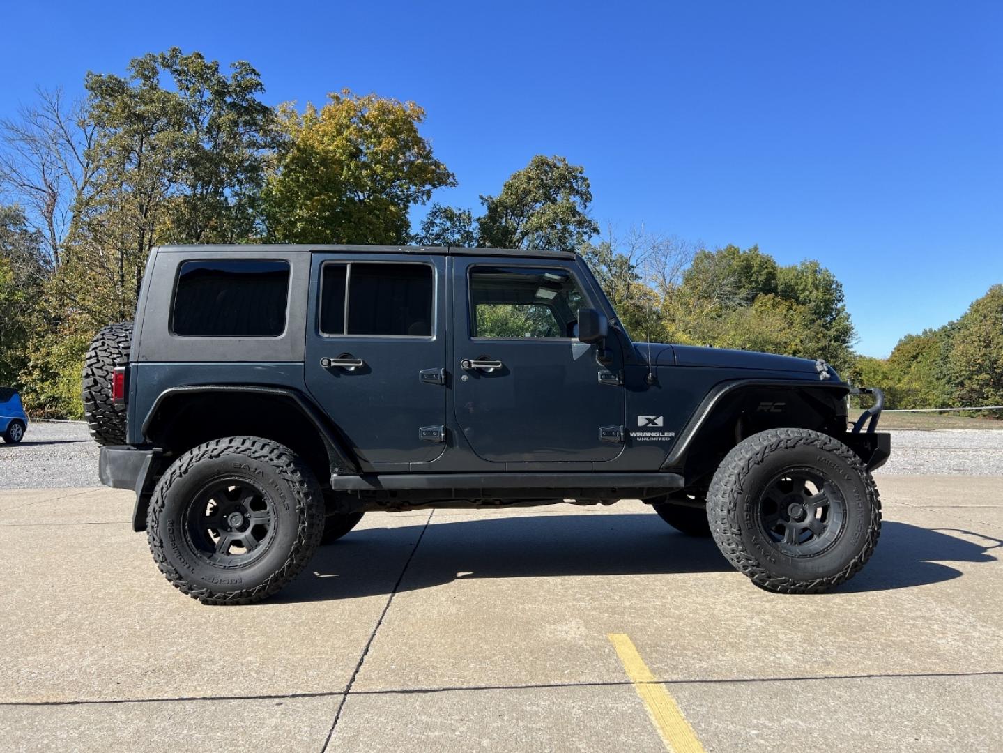 2008 BLUE /Gray Cloth Jeep Wrangler Unlimited X 4WD (1J4GA39108L) with an 3.8L V6 engine, Automatic transmission, located at 2990 Old Orchard Rd., Jackson, MO, 63755, 37.354214, -89.612106 - 2008 Jeep Wrangler Unlimited X 174xxx miles 4x4 3.8L V6 Automatic Cruise Power Windows/Locks We have financing available and we accept trades! Fill out a credit application on our website or come by today! If you have any questions, give us a call at (573) 204-7777 or visit our website at fi - Photo#5
