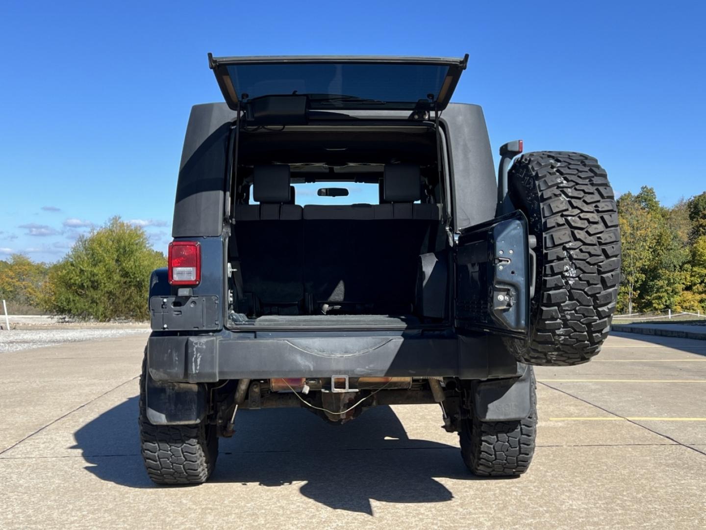 2008 BLUE /Gray Cloth Jeep Wrangler Unlimited X 4WD (1J4GA39108L) with an 3.8L V6 engine, Automatic transmission, located at 2990 Old Orchard Rd., Jackson, MO, 63755, 37.354214, -89.612106 - 2008 Jeep Wrangler Unlimited X 174xxx miles 4x4 3.8L V6 Automatic Cruise Power Windows/Locks We have financing available and we accept trades! Fill out a credit application on our website or come by today! If you have any questions, give us a call at (573) 204-7777 or visit our website at fi - Photo#16