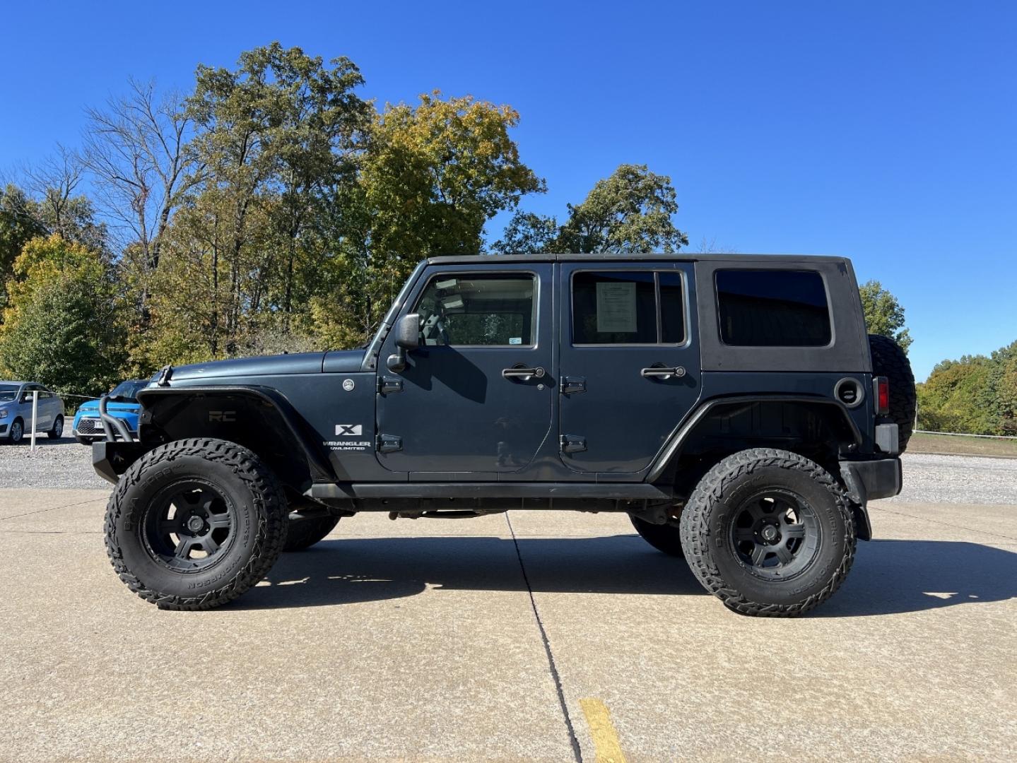 2008 BLUE /Gray Cloth Jeep Wrangler Unlimited X 4WD (1J4GA39108L) with an 3.8L V6 engine, Automatic transmission, located at 2990 Old Orchard Rd., Jackson, MO, 63755, 37.354214, -89.612106 - 2008 Jeep Wrangler Unlimited X 174xxx miles 4x4 3.8L V6 Automatic Cruise Power Windows/Locks We have financing available and we accept trades! Fill out a credit application on our website or come by today! If you have any questions, give us a call at (573) 204-7777 or visit our website at fi - Photo#4