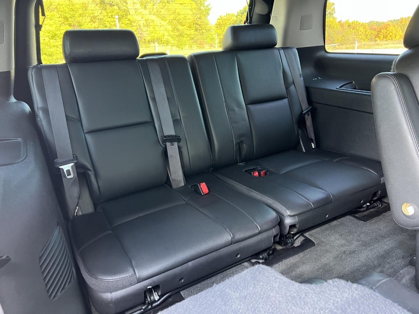 2014 BLACK /Black Leather Chevrolet Tahoe LTZ 4WD (1GNSKCE07ER) with an 5.3L V8 OHV 16V FFV engine, Automatic transmission, located at 2990 Old Orchard Rd., Jackson, MO, 63755, 37.354214, -89.612106 - 2014 Chevrolet Tahoe 1500 LTZ 155xxx miles 4 Wheel Drive 5.3L V8 Automatic Leather 3rd Row Navigation Rear Entertainment Backup Camera Power/Heated/Cooled Seats Heated Rear Seats Heated Steering Wheel Sunroof Remote Start Cruise Power Windows/Locks/Mirrors We have financing availabl - Photo#24