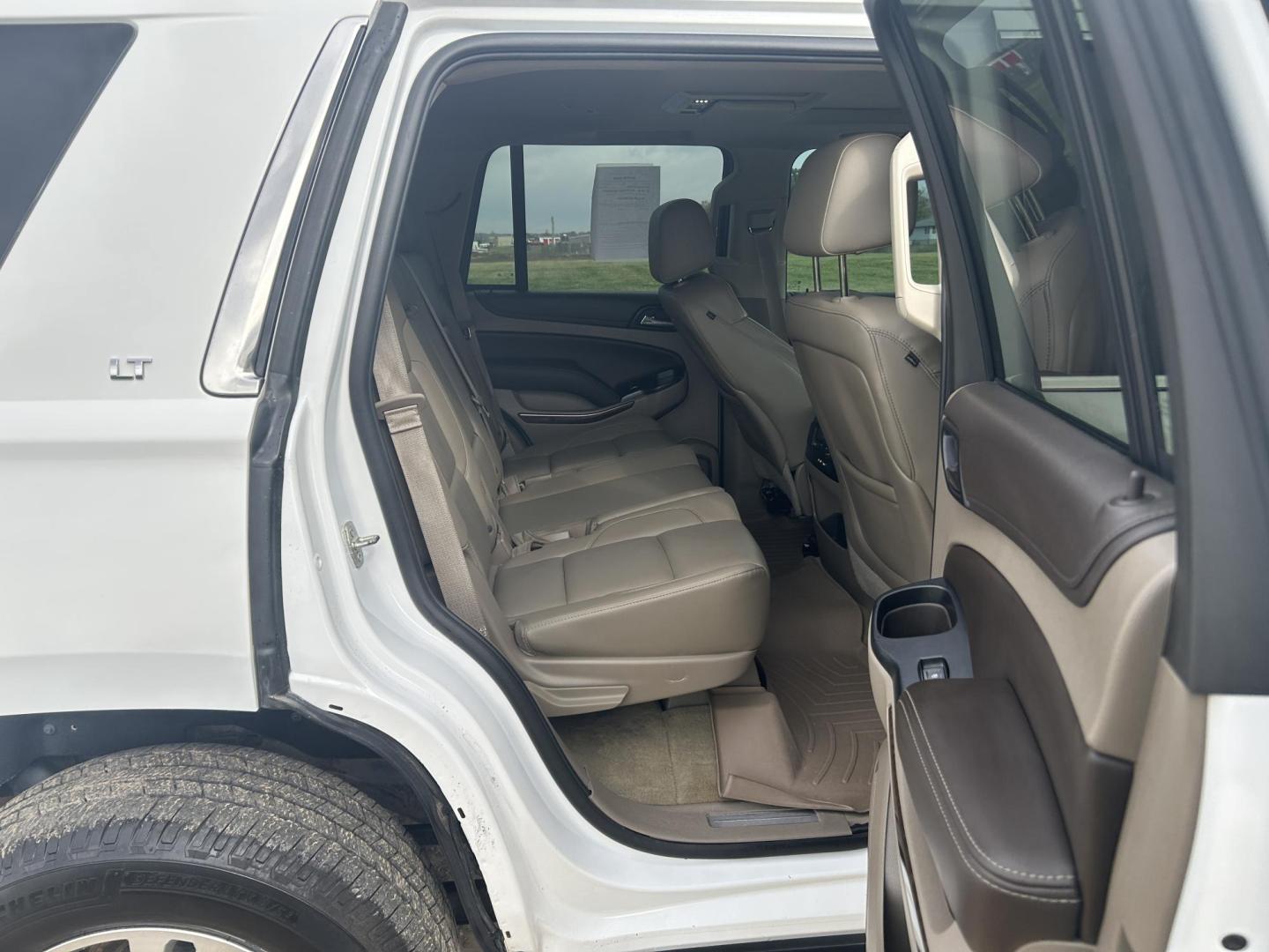2015 WHITE /Black Chevrolet Tahoe LT 4WD (1GNSKBKC7FR) with an 5.3L V8 OHV 16V engine, Automatic transmission, located at 506 S. Kingshighway, Cape Girardeau, MO, 63703, (573) 235-5000, 37.294991, -89.553635 - 2015 Chevrolet Tahoe 1500 LT 145xxx miles 4 Wheel Drive 5.3L V8 Automatic Leather 3rd Row Rear Entertainment Backup Camera Power/Heated Seats Sunroof Remote Start Cruise Power Windows/Locks/Mirrors We have financing available and we accept trades! Fill out a credit application on our w - Photo#19