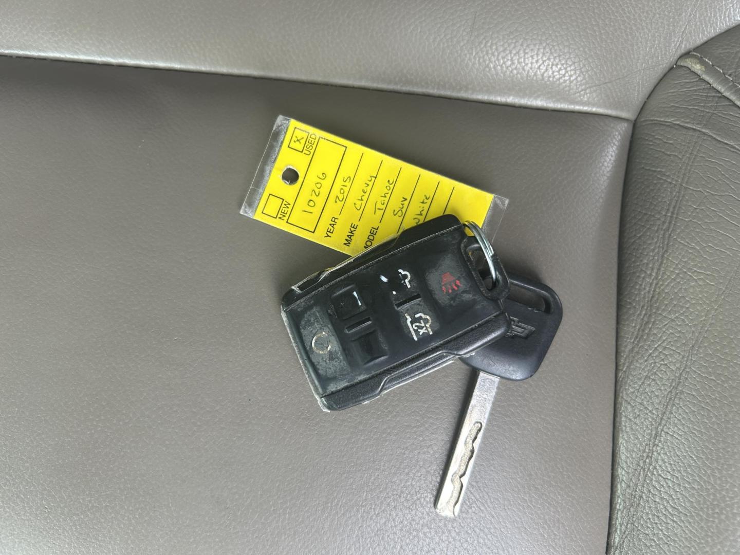 2015 WHITE /Black Chevrolet Tahoe LT 4WD (1GNSKBKC7FR) with an 5.3L V8 OHV 16V engine, Automatic transmission, located at 506 S. Kingshighway, Cape Girardeau, MO, 63703, (573) 235-5000, 37.294991, -89.553635 - 2015 Chevrolet Tahoe 1500 LT 145xxx miles 4 Wheel Drive 5.3L V8 Automatic Leather 3rd Row Rear Entertainment Backup Camera Power/Heated Seats Sunroof Remote Start Cruise Power Windows/Locks/Mirrors We have financing available and we accept trades! Fill out a credit application on our w - Photo#3