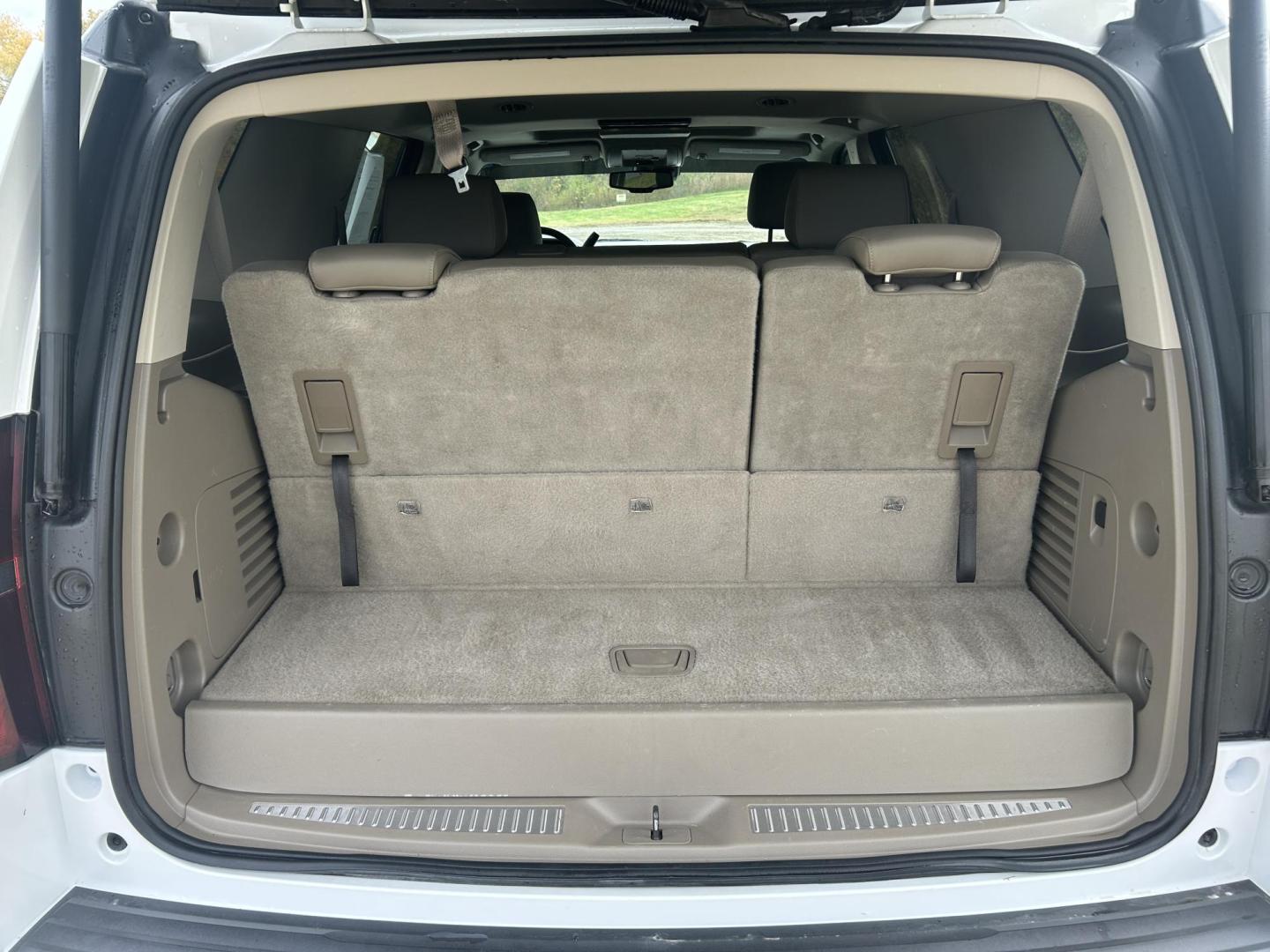 2015 WHITE /Black Chevrolet Tahoe LT 4WD (1GNSKBKC7FR) with an 5.3L V8 OHV 16V engine, Automatic transmission, located at 506 S. Kingshighway, Cape Girardeau, MO, 63703, (573) 235-5000, 37.294991, -89.553635 - 2015 Chevrolet Tahoe 1500 LT 145xxx miles 4 Wheel Drive 5.3L V8 Automatic Leather 3rd Row Rear Entertainment Backup Camera Power/Heated Seats Sunroof Remote Start Cruise Power Windows/Locks/Mirrors We have financing available and we accept trades! Fill out a credit application on our w - Photo#36