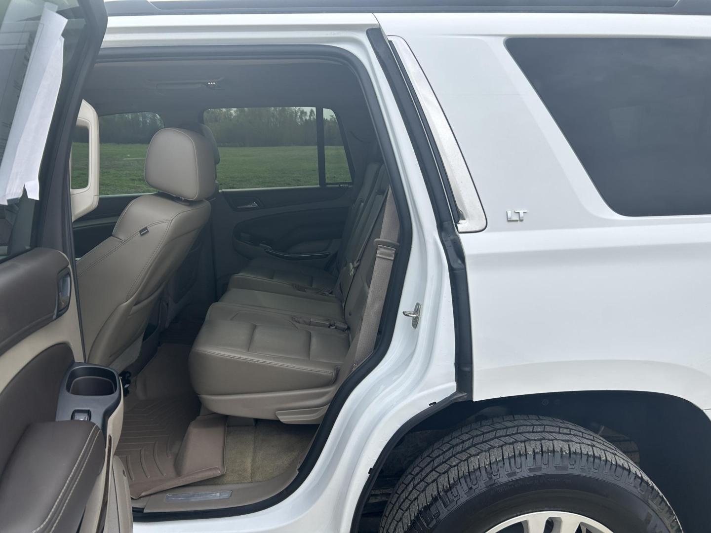 2015 WHITE /Black Chevrolet Tahoe LT 4WD (1GNSKBKC7FR) with an 5.3L V8 OHV 16V engine, Automatic transmission, located at 506 S. Kingshighway, Cape Girardeau, MO, 63703, (573) 235-5000, 37.294991, -89.553635 - 2015 Chevrolet Tahoe 1500 LT 145xxx miles 4 Wheel Drive 5.3L V8 Automatic Leather 3rd Row Rear Entertainment Backup Camera Power/Heated Seats Sunroof Remote Start Cruise Power Windows/Locks/Mirrors We have financing available and we accept trades! Fill out a credit application on our w - Photo#21
