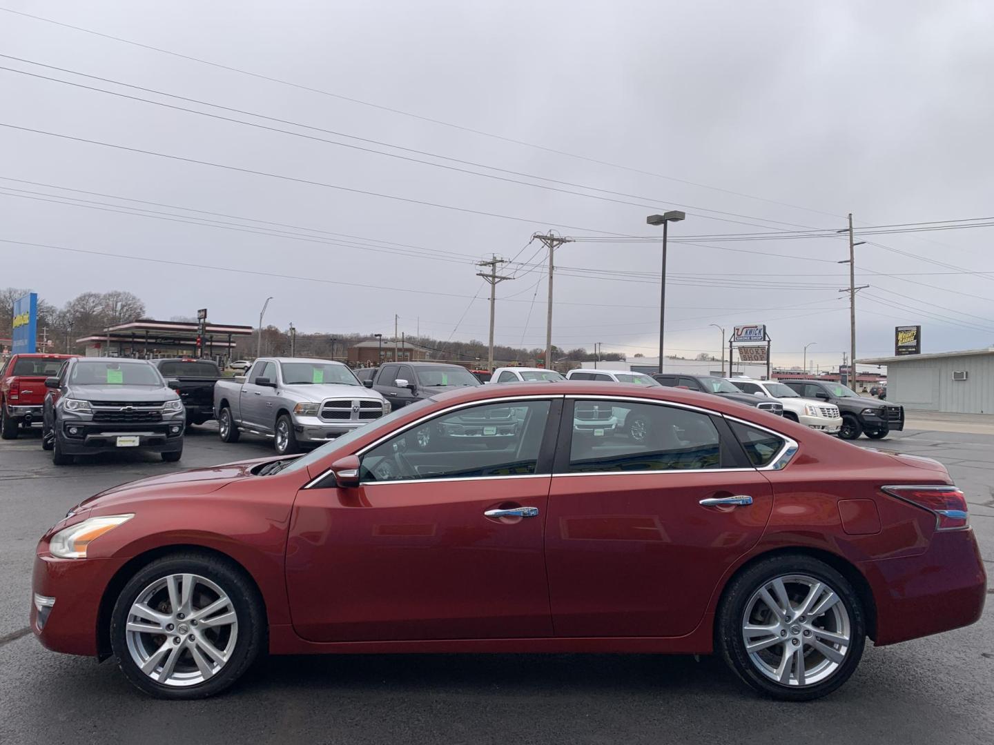 2015 RED /Black Nissan Altima 3.5 SV (1N4BL3AP9FC) with an 3.5L V6 DOHC 24V engine, Continuously Variable Transmission transmission, located at 506 S. Kingshighway, Cape Girardeau, MO, 63703, (573) 235-5000, 37.294991, -89.553635 - 2015 Nissan Altima 3.5 SL Leather Remote Start Air Conditioning Power Windows Power Locks Power Steering Tilt Wheel AM/FM CD/MP3 Satellite Keyless Entry Dual Front Airbags Side Airbags Head Airbags Rear Head Airbags All Wheel ABS We have financing available and we accept trades! Fill - Photo#3