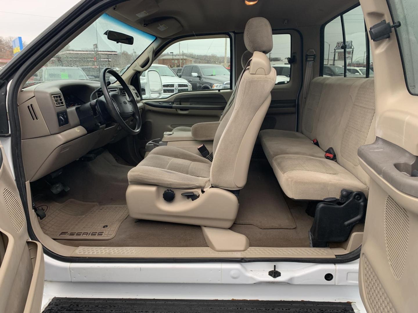 2001 WHITE /TAN Ford F-350 SD Lariat SuperCab 2WD DRW (1FTWX32F41E) with an 7.3L V8 OHV 16V TURBO DIESEL engine, Automatic transmission, located at 506 S. Kingshighway, Cape Girardeau, MO, 63703, (573) 235-5000, 37.294991, -89.553635 - 2001 Ford F350 Dually 7.3L Diesel Power Steering Tilt Wheel AM/FM Cassette & CD Dual Front Airbags Passenger Airbag Sensor Extended Cab Regular Bed All Wheel ABS 1 Ton Dually We have financing available and we accept trades! Fill out a credit application on our website or come by today! I - Photo#15