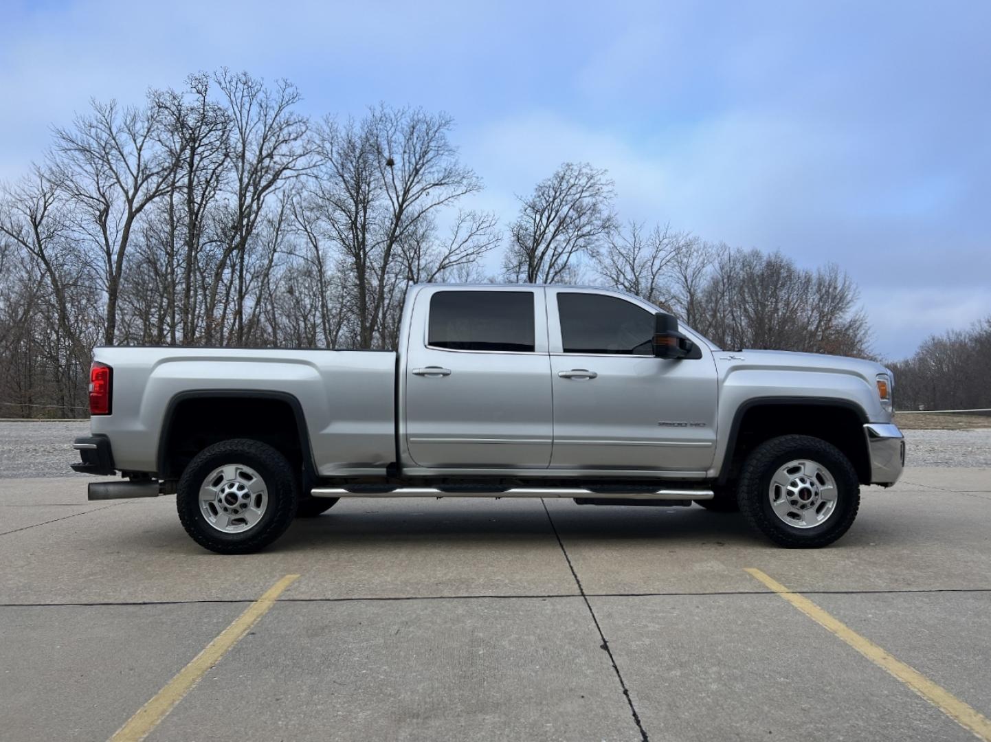 2016 SILVER /Tan GMC Sierra 2500HD SLE Crew Cab 4WD (1GT12SE85GF) with an 6.6L V8 DIESEL engine, Automatic transmission, located at 2990 Old Orchard Rd., Jackson, MO, 63755, 37.354214, -89.612106 - 2016 GMC Sierra 2500HD SLE 129xxx miles 4x4 6.6L V8 Turbo Diesel Automatic Backup Camera Power Driver Seat Bluetooth Remote Start Cruise Power Windows/Locks/Mirrors We have financing available and we accept trades! Fill out a credit application on our website or come by today! If you hav - Photo#7
