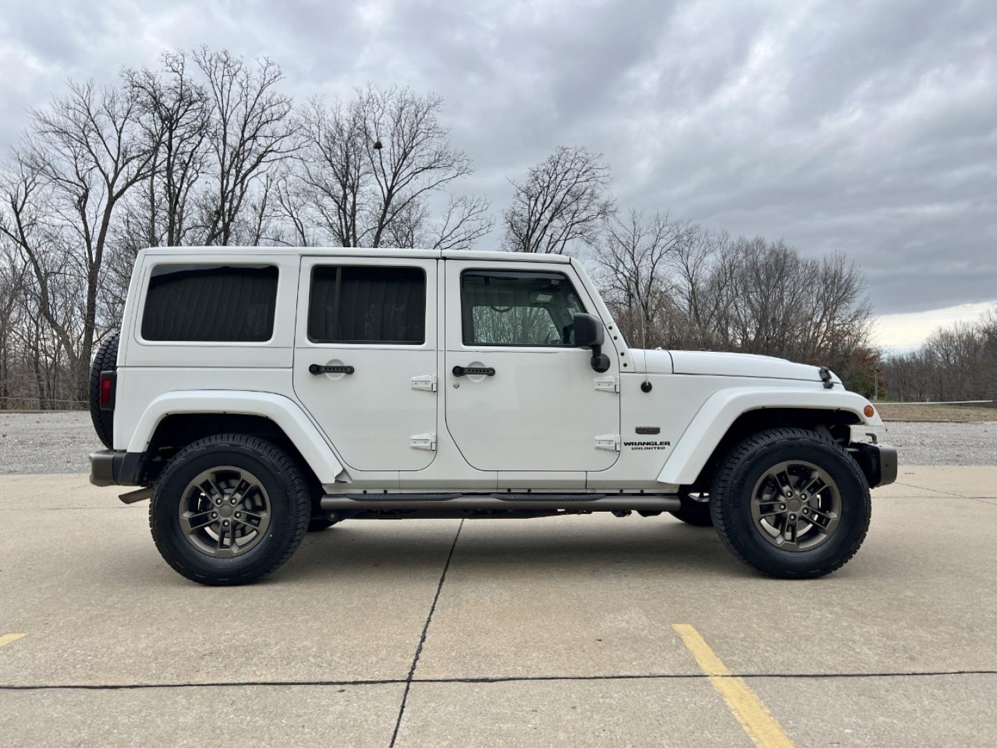 2016 WHITE /Black Jeep Wrangler Unlimited Sahara 4WD (1C4BJWEG9GL) with an 3.6L V6 engine, Automatic transmission, located at 2990 Old Orchard Rd., Jackson, MO, 63755, 37.354214, -89.612106 - 2016 Jeep Wrangler Unlimited Sahara 75th Anniversary 1-Owner 129xxx miles 4 Wheel Drive 3.6L V6 Automatic Leather Heated Seats Bluetooth Cruise Power Windows/Locks/Mirrors We have financing available and we accept trades! Fill out a credit application on our website or come by today! If - Photo#6