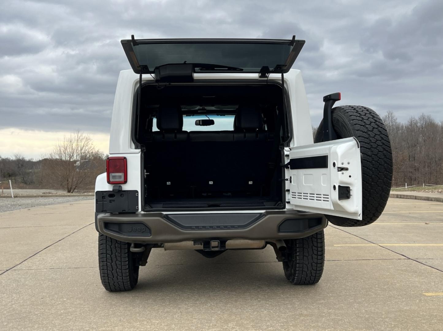 2016 WHITE /Black Jeep Wrangler Unlimited Sahara 4WD (1C4BJWEG9GL) with an 3.6L V6 engine, Automatic transmission, located at 2990 Old Orchard Rd., Jackson, MO, 63755, 37.354214, -89.612106 - 2016 Jeep Wrangler Unlimited Sahara 75th Anniversary 1-Owner 129xxx miles 4 Wheel Drive 3.6L V6 Automatic Leather Heated Seats Bluetooth Cruise Power Windows/Locks/Mirrors We have financing available and we accept trades! Fill out a credit application on our website or come by today! If - Photo#17