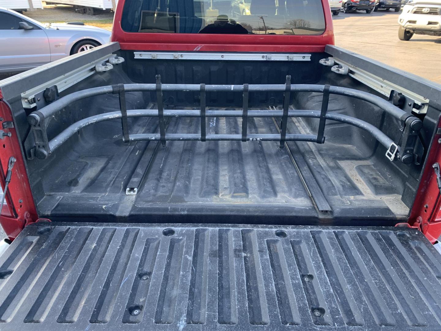 2007 RED /GRAY Nissan Frontier LE Crew Cab 2WD (1N6AD07U37C) with an 4.0L V6 DOHC 24V engine, 5-Speed Automatic Overdrive transmission, located at 506 S. Kingshighway, Cape Girardeau, MO, 63703, (573) 235-5000, 37.294991, -89.553635 - 2007 Nissan Frontier LE Air Conditioning Power Steering Tilt Whee Dual Air Bags Front and Sides Crew Cab Regular Bed All Wheel ABS We have financing available and we accept trades! Fill out a credit application on our website or come by today! If you have any questions, give us a call at - Photo#6