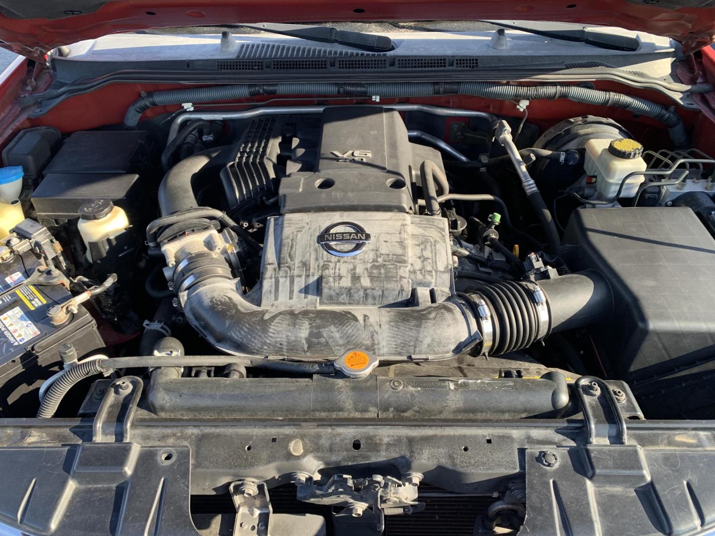 2007 RED /GRAY Nissan Frontier LE Crew Cab 2WD (1N6AD07U37C) with an 4.0L V6 DOHC 24V engine, 5-Speed Automatic Overdrive transmission, located at 506 S. Kingshighway, Cape Girardeau, MO, 63703, (573) 235-5000, 37.294991, -89.553635 - 2007 Nissan Frontier LE Air Conditioning Power Steering Tilt Whee Dual Air Bags Front and Sides Crew Cab Regular Bed All Wheel ABS We have financing available and we accept trades! Fill out a credit application on our website or come by today! If you have any questions, give us a call at - Photo#9