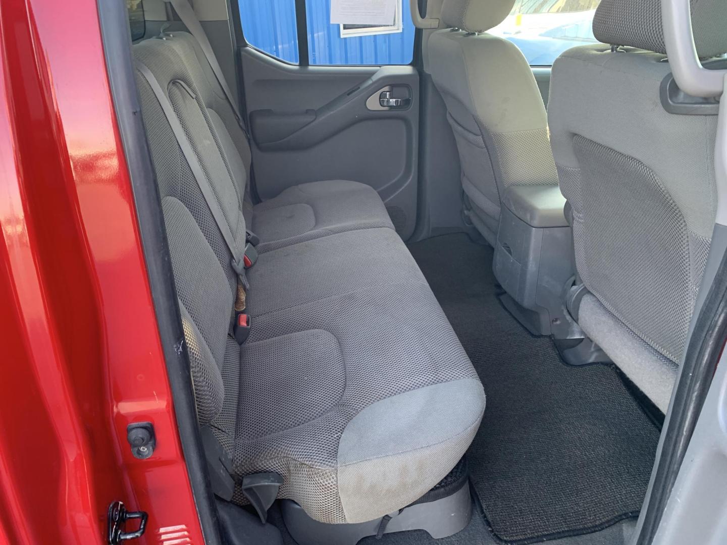 2007 RED /GRAY Nissan Frontier LE Crew Cab 2WD (1N6AD07U37C) with an 4.0L V6 DOHC 24V engine, 5-Speed Automatic Overdrive transmission, located at 506 S. Kingshighway, Cape Girardeau, MO, 63703, (573) 235-5000, 37.294991, -89.553635 - 2007 Nissan Frontier LE Air Conditioning Power Steering Tilt Whee Dual Air Bags Front and Sides Crew Cab Regular Bed All Wheel ABS We have financing available and we accept trades! Fill out a credit application on our website or come by today! If you have any questions, give us a call at - Photo#13