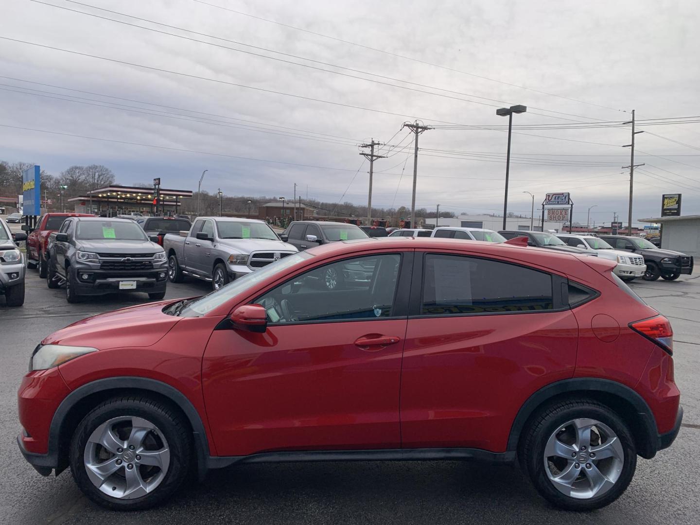2016 RED /BLACK Honda HR-V EX (3CZRU6H57GM) with an 1.8L L4 DOHC 16V engine, Automatic transmission, located at 506 S. Kingshighway, Cape Girardeau, MO, 63703, (573) 235-5000, 37.294991, -89.553635 - 2016 Honda HR-V 137,xxx Miles Automatic Heated Seats Backup Camera Sunroof All Wheel Drive Power Windows/Locks/Mirrors Bluetooth We have financing available and we accept trades! Fill out a credit application on our website or come by today! If you have any questions, give us a call at ( - Photo#3