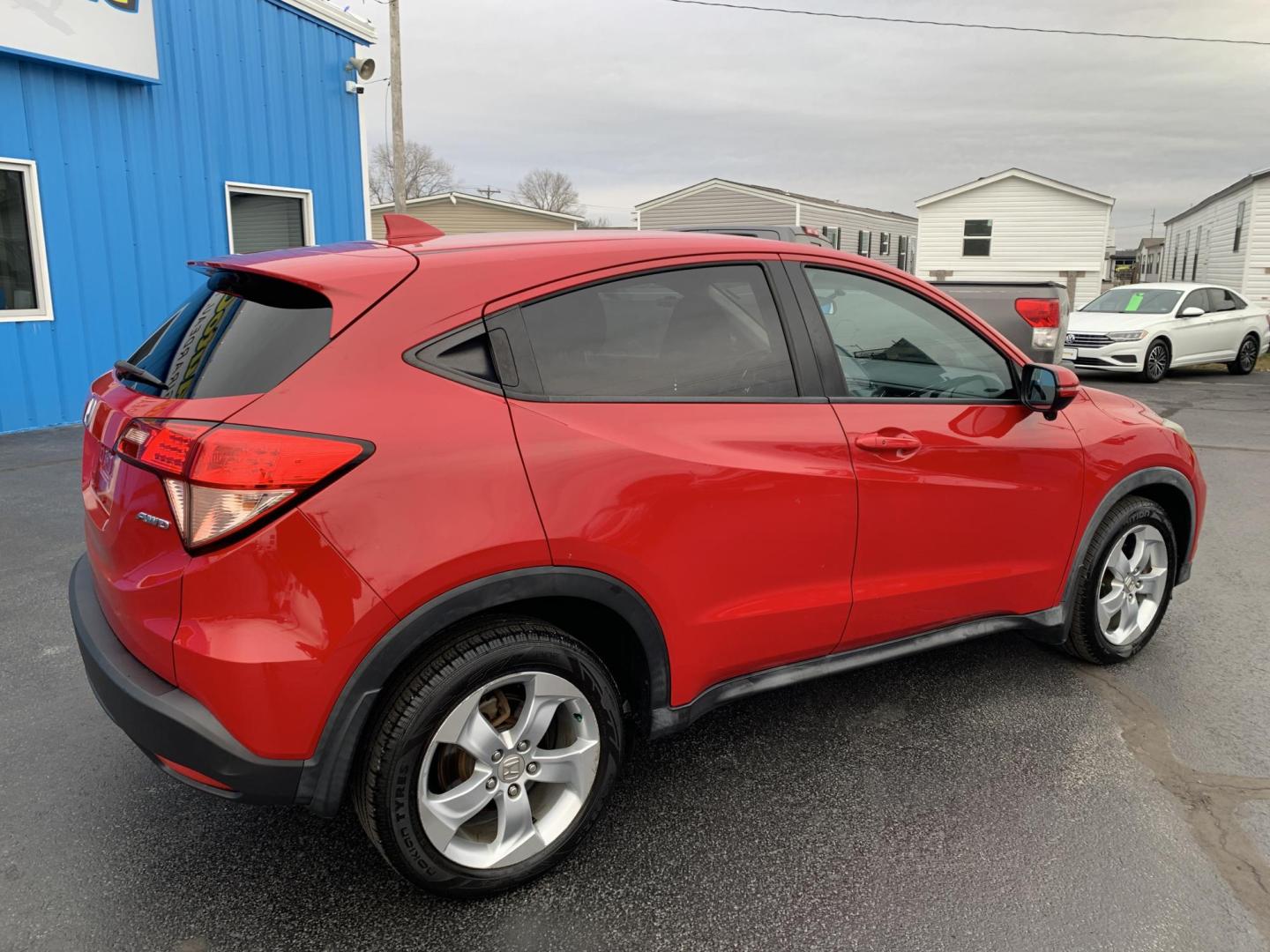 2016 RED /BLACK Honda HR-V EX (3CZRU6H57GM) with an 1.8L L4 DOHC 16V engine, Automatic transmission, located at 506 S. Kingshighway, Cape Girardeau, MO, 63703, (573) 235-5000, 37.294991, -89.553635 - 2016 Honda HR-V 137,xxx Miles Automatic Heated Seats Backup Camera Sunroof All Wheel Drive Power Windows/Locks/Mirrors Bluetooth We have financing available and we accept trades! Fill out a credit application on our website or come by today! If you have any questions, give us a call at ( - Photo#7