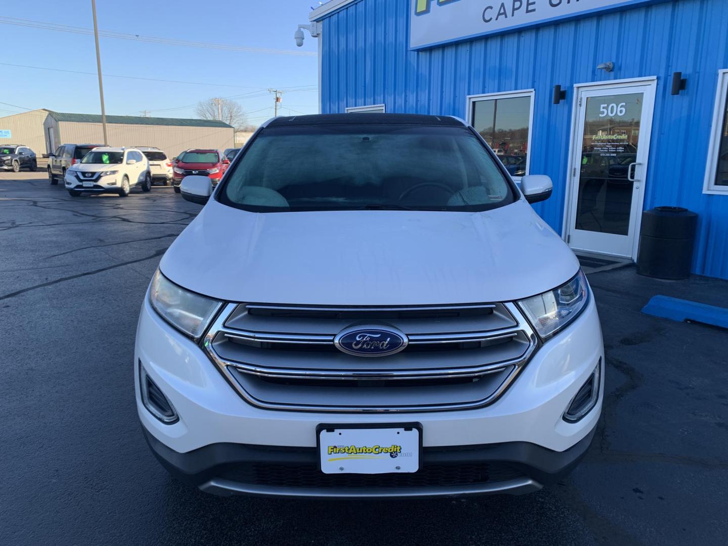 2015 WHITE /BLACK Ford Edge Titanium (2FMPK3K96FB) with an 2.0L L4 DOHC 16V engine, Automatic transmission, located at 506 S. Kingshighway, Cape Girardeau, MO, 63703, (573) 235-5000, 37.294991, -89.553635 - 2015 Ford Edge Titanium 2.0L 4 Cyl. Automatic Leather Navigation Backup Camera Power/Heated Seats Bluetooth Cruise Power Windows/Locks/Mirrors We have financing available and we accept trades! Fill out a credit application on our website or come by today! If you have - Photo#1