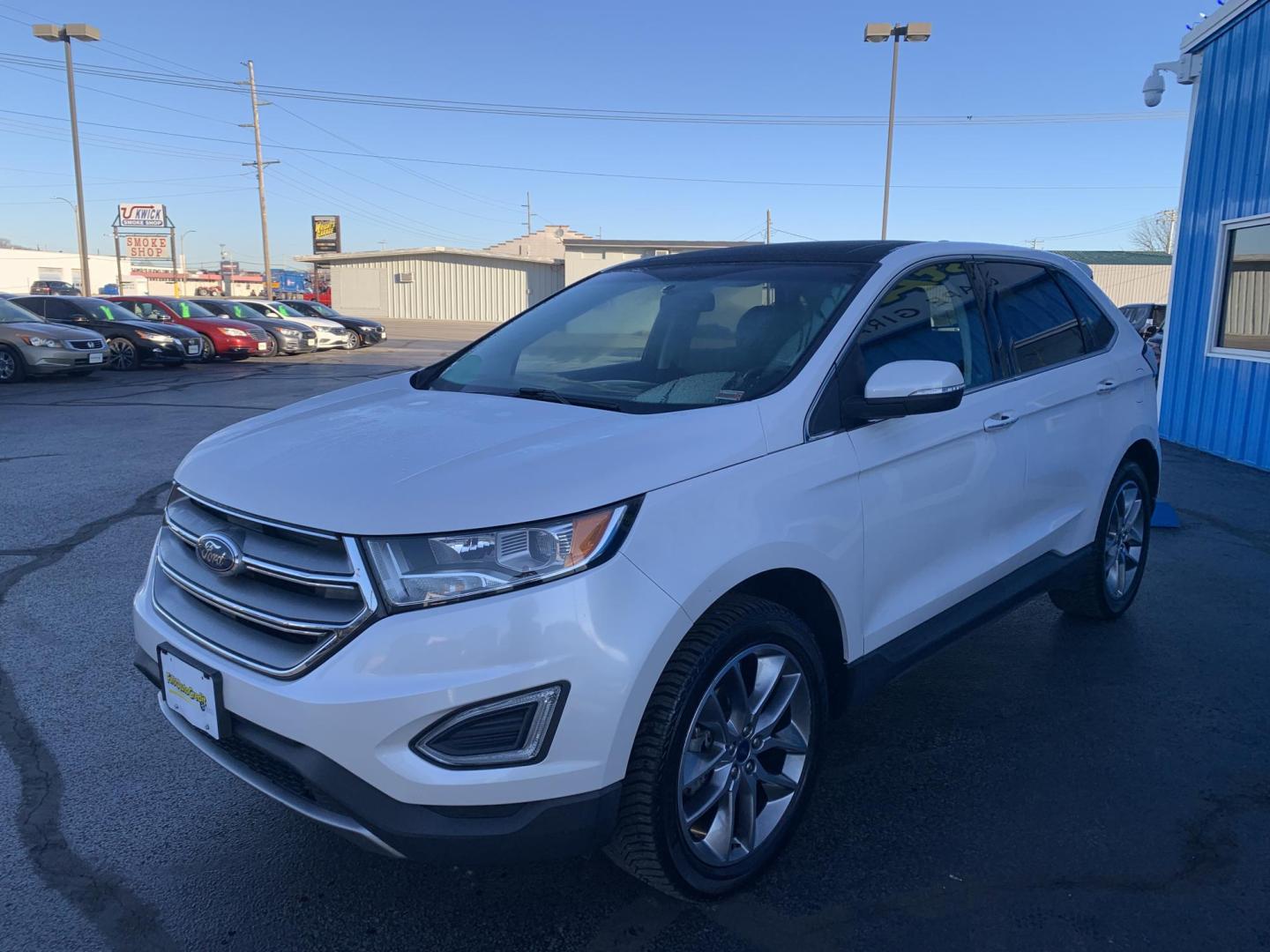 2015 WHITE /BLACK Ford Edge Titanium (2FMPK3K96FB) with an 2.0L L4 DOHC 16V engine, Automatic transmission, located at 506 S. Kingshighway, Cape Girardeau, MO, 63703, (573) 235-5000, 37.294991, -89.553635 - 2015 Ford Edge Titanium 2.0L 4 Cyl. Automatic Leather Navigation Backup Camera Power/Heated Seats Bluetooth Cruise Power Windows/Locks/Mirrors We have financing available and we accept trades! Fill out a credit application on our website or come by today! If you have - Photo#2