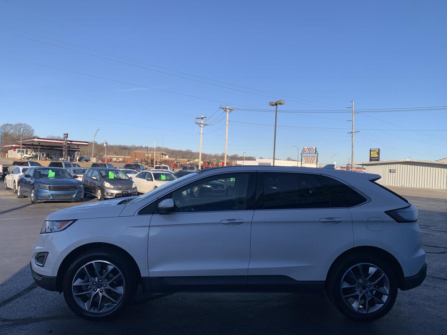 2015 WHITE /BLACK Ford Edge Titanium (2FMPK3K96FB) with an 2.0L L4 DOHC 16V engine, Automatic transmission, located at 506 S. Kingshighway, Cape Girardeau, MO, 63703, (573) 235-5000, 37.294991, -89.553635 - 2015 Ford Edge Titanium 2.0L 4 Cyl. Automatic Leather Navigation Backup Camera Power/Heated Seats Bluetooth Cruise Power Windows/Locks/Mirrors We have financing available and we accept trades! Fill out a credit application on our website or come by today! If you have - Photo#3