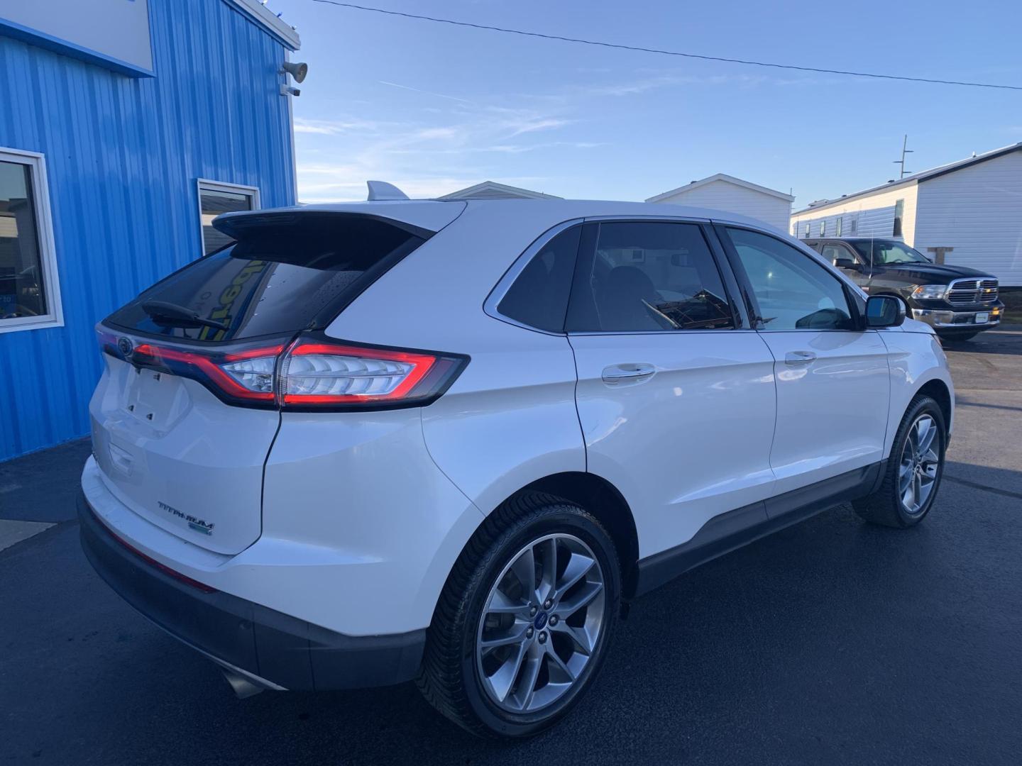 2015 WHITE /BLACK Ford Edge Titanium (2FMPK3K96FB) with an 2.0L L4 DOHC 16V engine, Automatic transmission, located at 506 S. Kingshighway, Cape Girardeau, MO, 63703, (573) 235-5000, 37.294991, -89.553635 - 2015 Ford Edge Titanium 2.0L 4 Cyl. Automatic Leather Navigation Backup Camera Power/Heated Seats Bluetooth Cruise Power Windows/Locks/Mirrors We have financing available and we accept trades! Fill out a credit application on our website or come by today! If you have - Photo#10