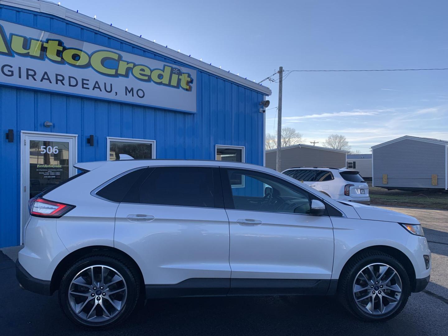 2015 WHITE /BLACK Ford Edge Titanium (2FMPK3K96FB) with an 2.0L L4 DOHC 16V engine, Automatic transmission, located at 506 S. Kingshighway, Cape Girardeau, MO, 63703, (573) 235-5000, 37.294991, -89.553635 - 2015 Ford Edge Titanium 2.0L 4 Cyl. Automatic Leather Navigation Backup Camera Power/Heated Seats Bluetooth Cruise Power Windows/Locks/Mirrors We have financing available and we accept trades! Fill out a credit application on our website or come by today! If you have - Photo#11