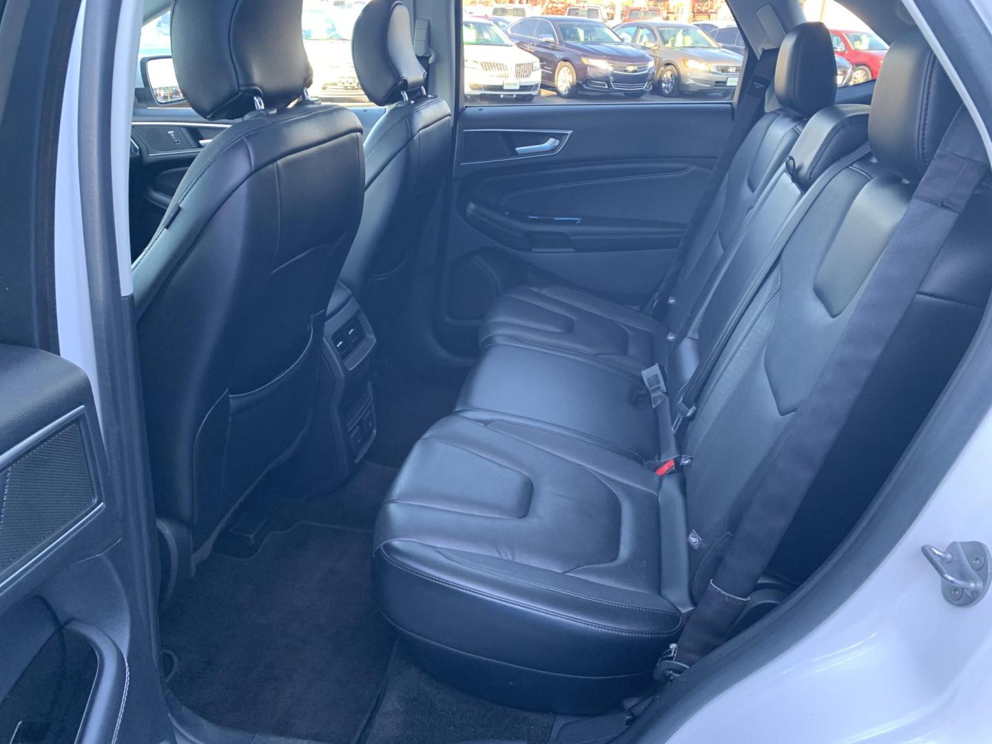 2015 WHITE /BLACK Ford Edge Titanium (2FMPK3K96FB) with an 2.0L L4 DOHC 16V engine, Automatic transmission, located at 506 S. Kingshighway, Cape Girardeau, MO, 63703, (573) 235-5000, 37.294991, -89.553635 - 2015 Ford Edge Titanium 2.0L 4 Cyl. Automatic Leather Navigation Backup Camera Power/Heated Seats Bluetooth Cruise Power Windows/Locks/Mirrors We have financing available and we accept trades! Fill out a credit application on our website or come by today! If you have - Photo#18