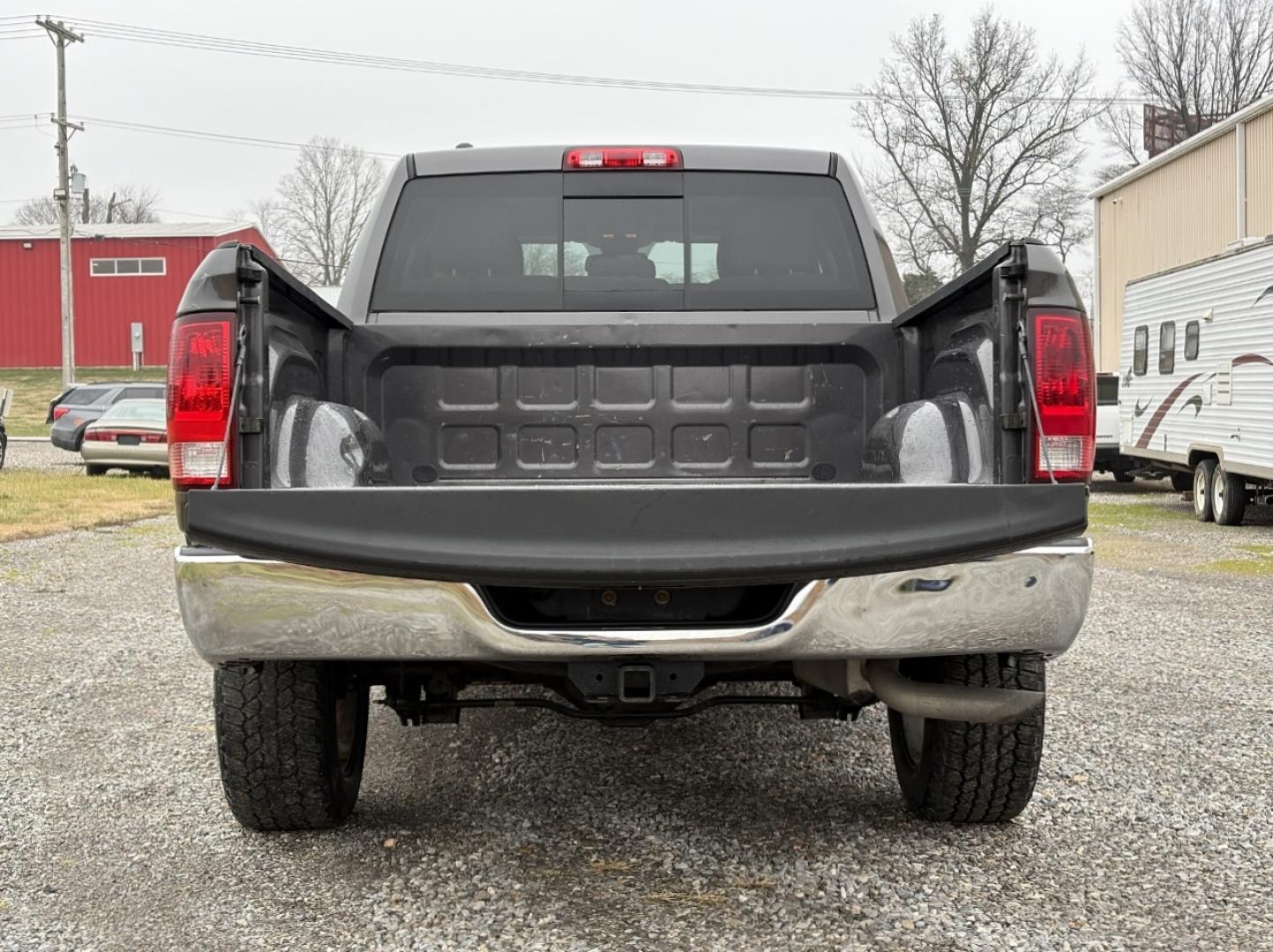2014 GRAY /Gray RAM 1500 SLT Quad Cab 4WD (1C6RR7GG2ES) with an 3.6L V6 engine, Automatic transmission, located at 506 S. Kingshighway, Cape Girardeau, MO, 63703, (573) 235-5000, 37.294991, -89.553635 - 2014 Ram 1500 Big Horn 1-Owner 138xxx miles 4x4 3.6L V6 Automatic Power Driver Seat Bluetooth Remote Start Cruise Power Windows/Locks/Mirrors We have financing available and we accept trades! Fill out a credit application on our website or come by today! If you have any questions, give u - Photo#18