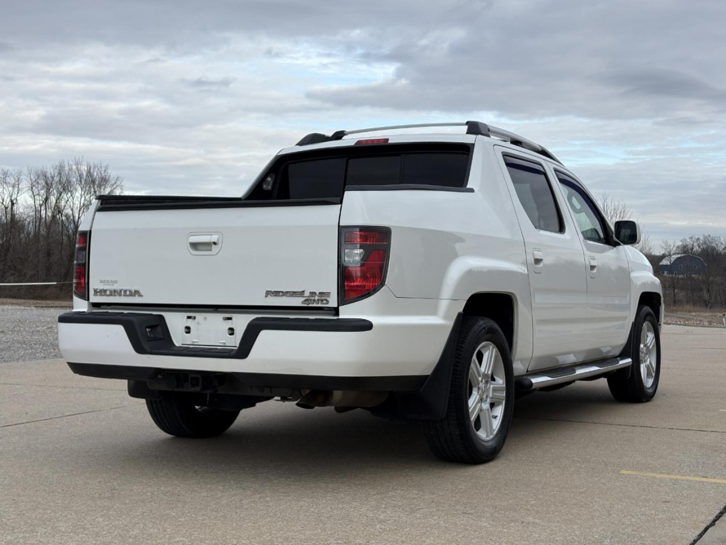2013 WHITE /Gray Honda Ridgeline RTL (5FPYK1F50DB) with an 3.5L V6 engine, Automatic transmission, located at 2990 Old Orchard Rd., Jackson, MO, 63755, 37.354214, -89.612106 - 2013 Honda Ridgeline RTL 80xxx miles 4x4 3.5L V6 Automatic Leather Navigation Power/Heated Seats Backup Camera Sunroof Cruise Power Windows/Locks/Mirrors We have financing available and we accept trades! Fill out a credit application on our website or come by today! If you have any ques - Photo#11