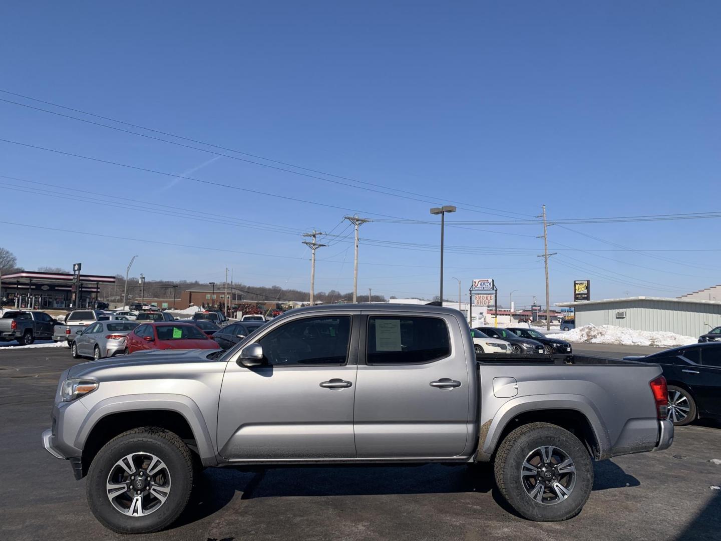 2016 SILVER /GRAY Toyota Tacoma SR5 Double Cab Long Bed V6 5AT 4WD (3TMCZ5ANXGM) with an 3.6L V6 DOHC 24V engine, Automatic transmission, located at 506 S. Kingshighway, Cape Girardeau, MO, 63703, (573) 235-5000, 37.294991, -89.553635 - 2016 Toyota Tacoma SR5 Double Cab 203,xxx miles Alarm System Bluetooth Cloth Seats Cruise Control Navigation System Power Windows Remote Keyless Entry Steering Wheel Controls Tilt Steering Wheel We have financing available and we accept trades! Fill out a credit application on our website - Photo#3