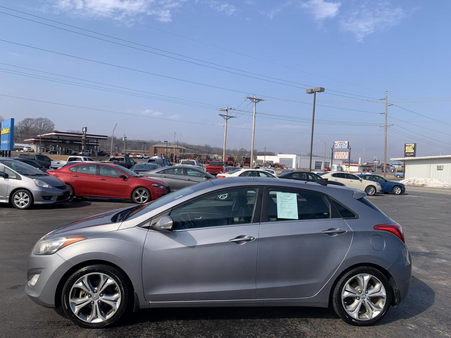 2013 GRAY /GRAY Hyundai Elantra GT GT (KMHD35LE5DU) with an 1.8L L4 16V DOHC engine, 6-Speed Manual transmission, located at 506 S. Kingshighway, Cape Girardeau, MO, 63703, (573) 235-5000, 37.294991, -89.553635 - 2013 Hyundai Elantra GT One Owner 98,xxx miles Alarm System Bluetooth Wireless Technology CD Player Cloth Seats Cruise Control Folding Rear Seat Heated Seats Power Driver's Seat Power Outlet Power Windows Keyless Entry Rear Window Defroster Remote Keyless Entry Steering Wheel Control - Photo#3