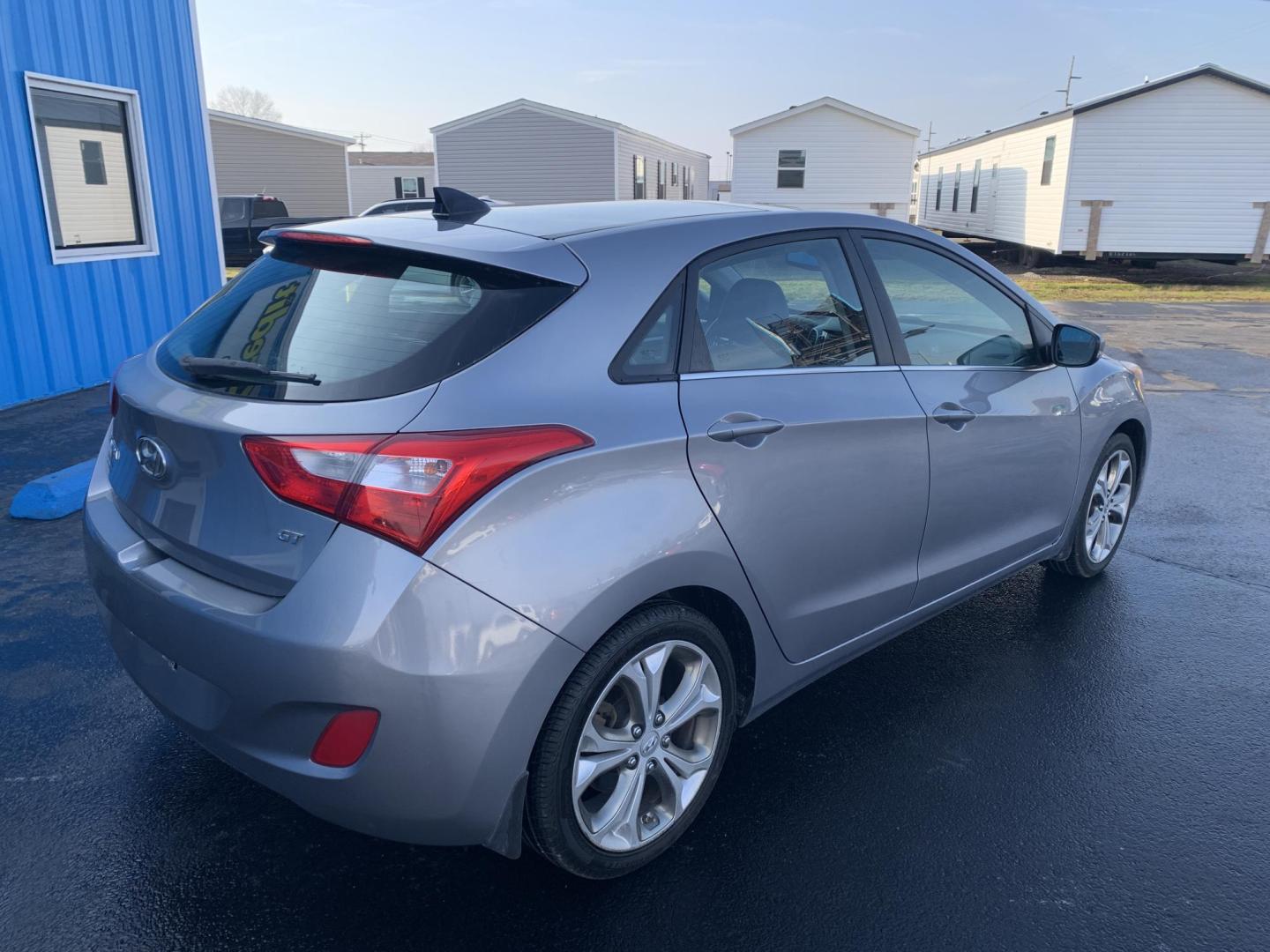 2013 GRAY /GRAY Hyundai Elantra GT GT (KMHD35LE5DU) with an 1.8L L4 16V DOHC engine, 6-Speed Manual transmission, located at 506 S. Kingshighway, Cape Girardeau, MO, 63703, (573) 235-5000, 37.294991, -89.553635 - 2013 Hyundai Elantra GT One Owner 98,xxx miles Alarm System Bluetooth Wireless Technology CD Player Cloth Seats Cruise Control Folding Rear Seat Heated Seats Power Driver's Seat Power Outlet Power Windows Keyless Entry Rear Window Defroster Remote Keyless Entry Steering Wheel Control - Photo#7
